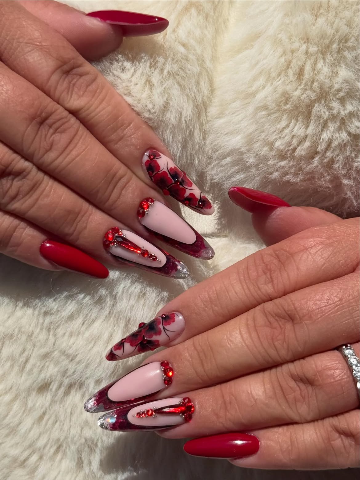 Crimson Poppy Almond Nails with Rhinestone Accents