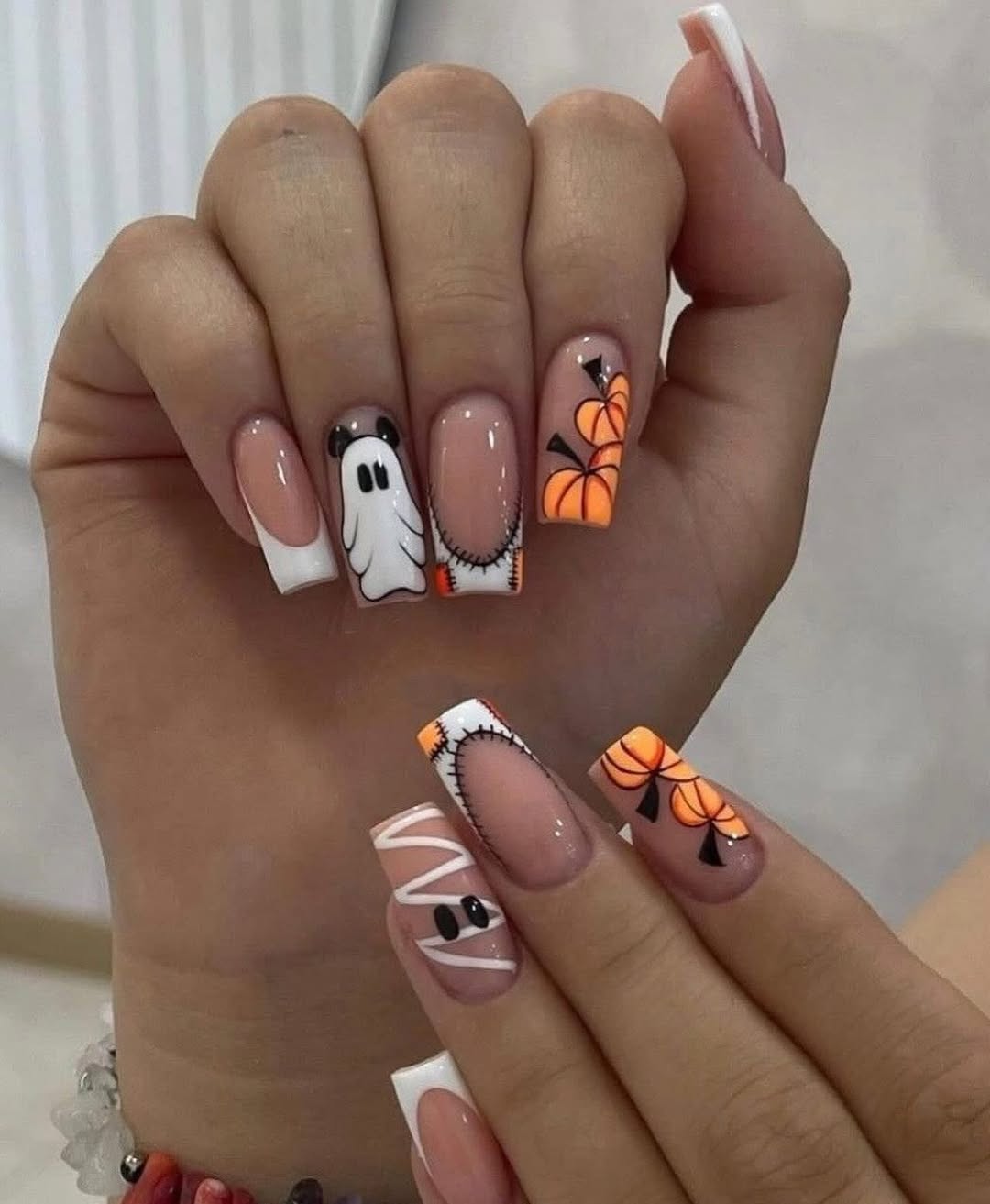 28 Stunning Pumpkin Nail Ideas for a Chic Fall Look 16 Cute Ghost and Pumpkin French Tip Nails