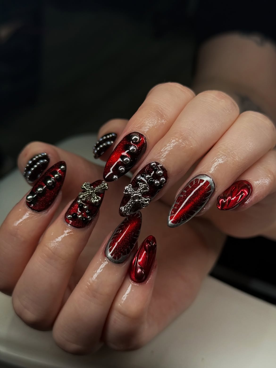 Dark Red Cat Eye Coffin Nails with Silver Accents
