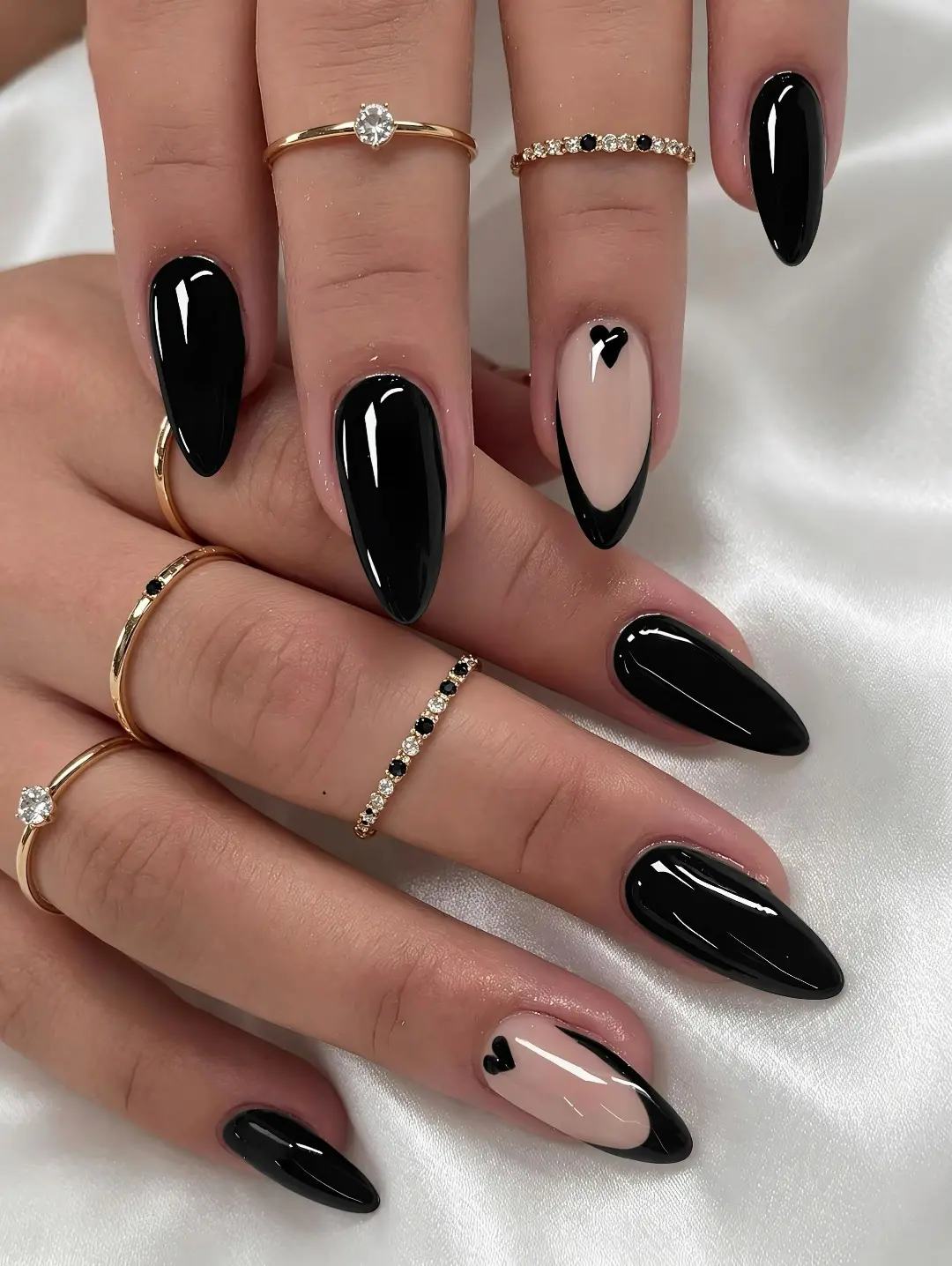 Deep Black Glossy Almond Nails With Black Heart French Tips
