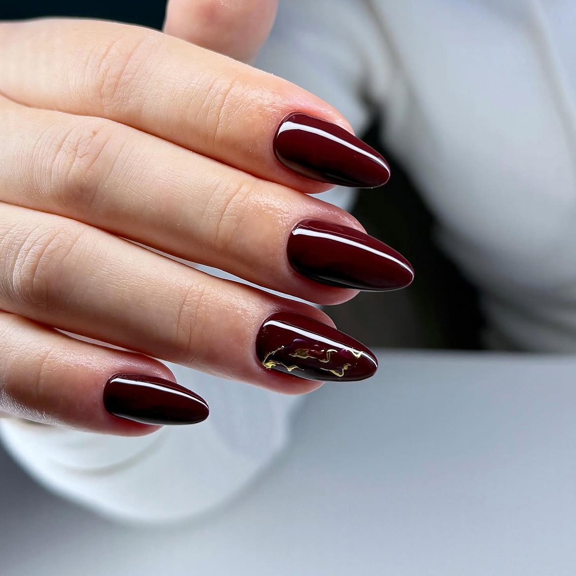Deep Burgundy Almond Nails with Gold Detail