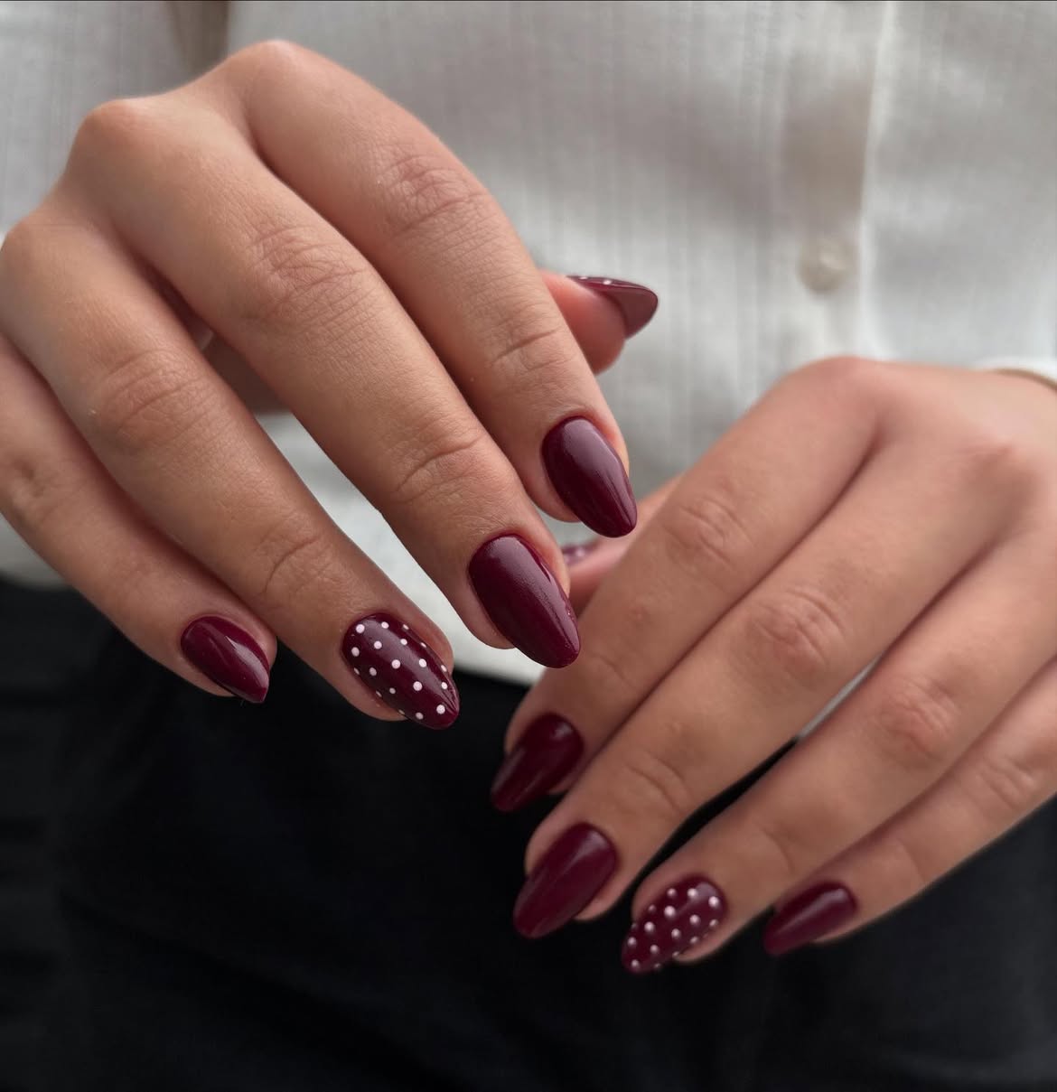Deep Burgundy Almond Nails with White Polka Dots