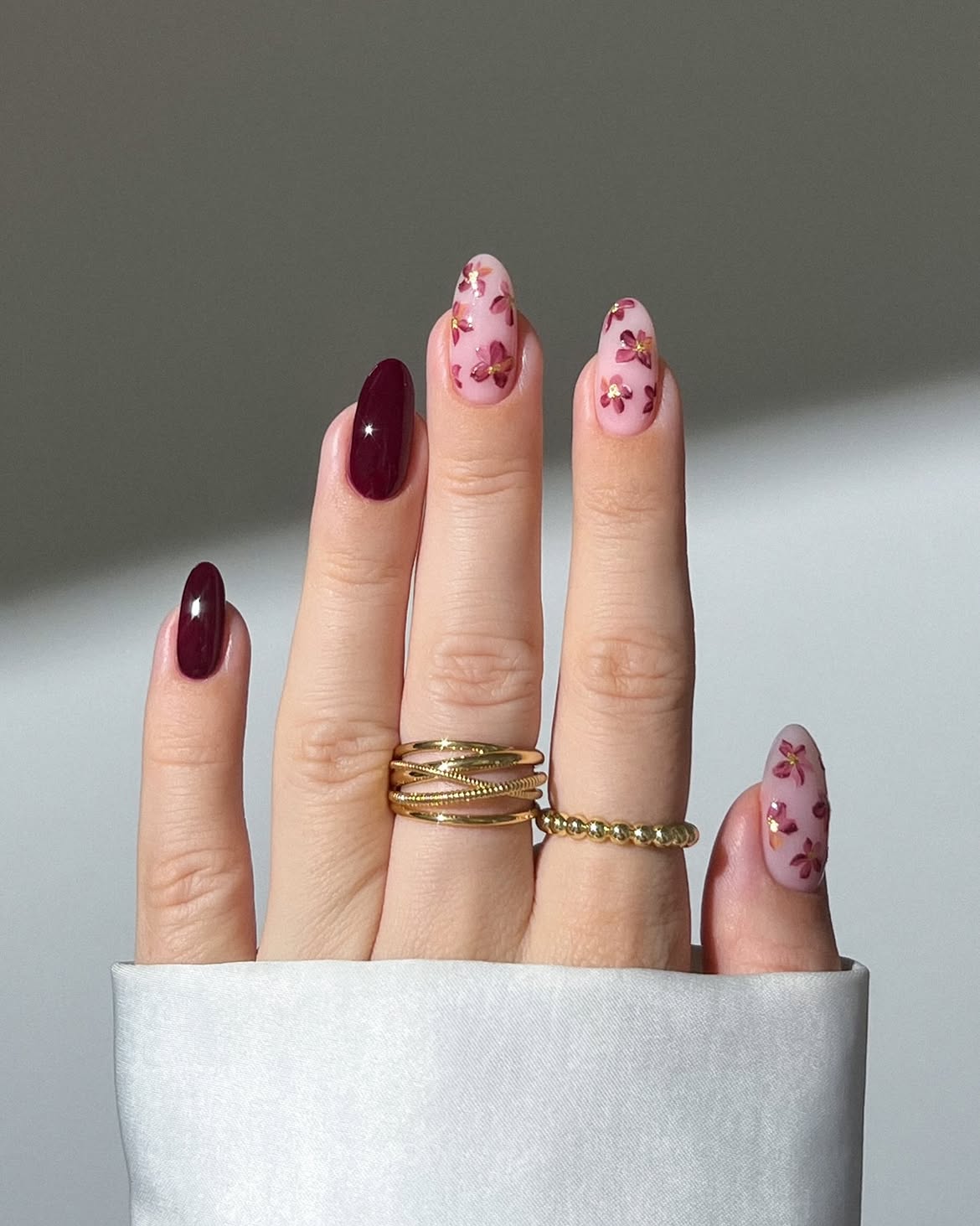 Deep Burgundy Floral Accent Almond Nails