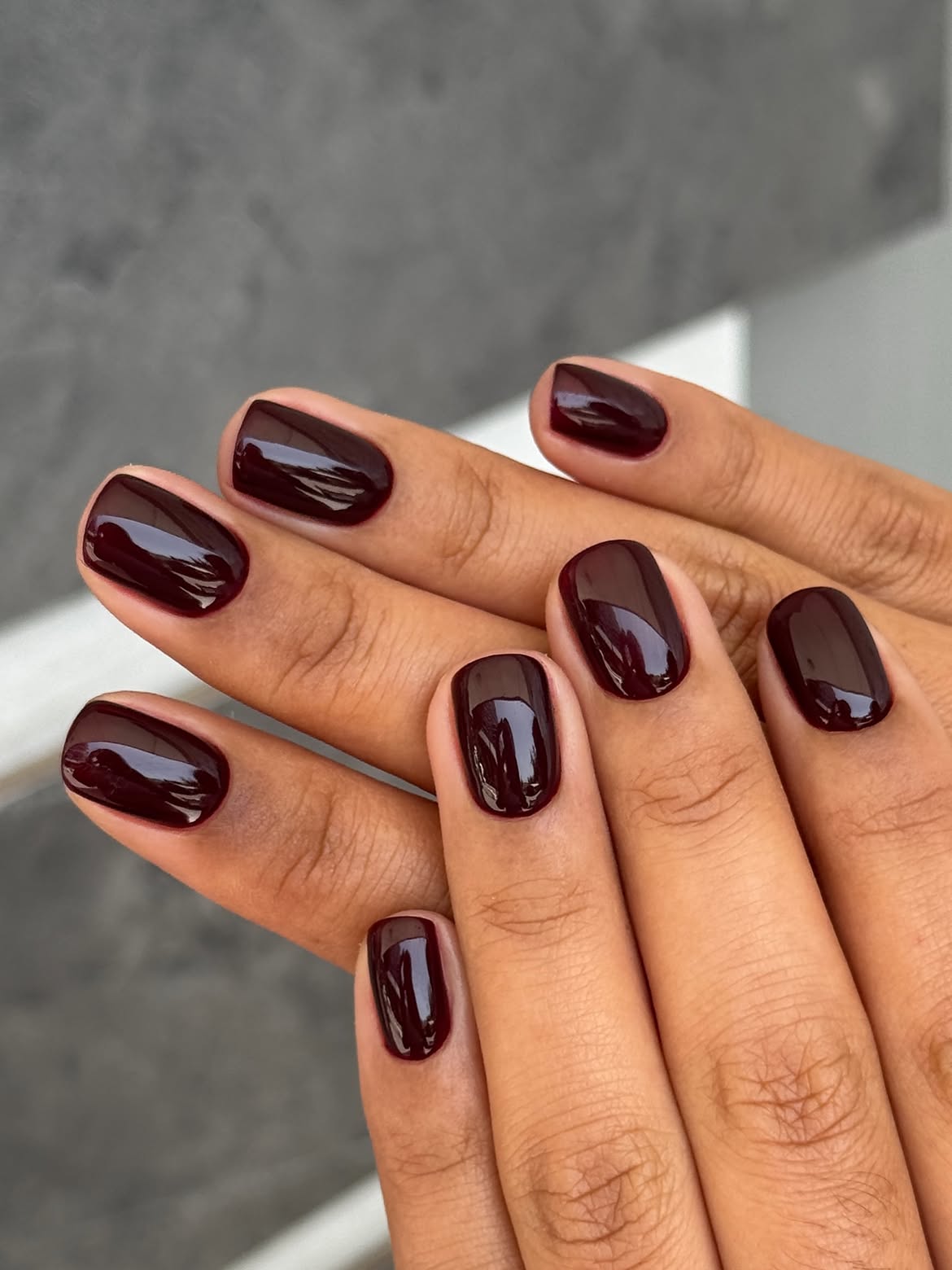 Deep Burgundy Glossy Almond Nails