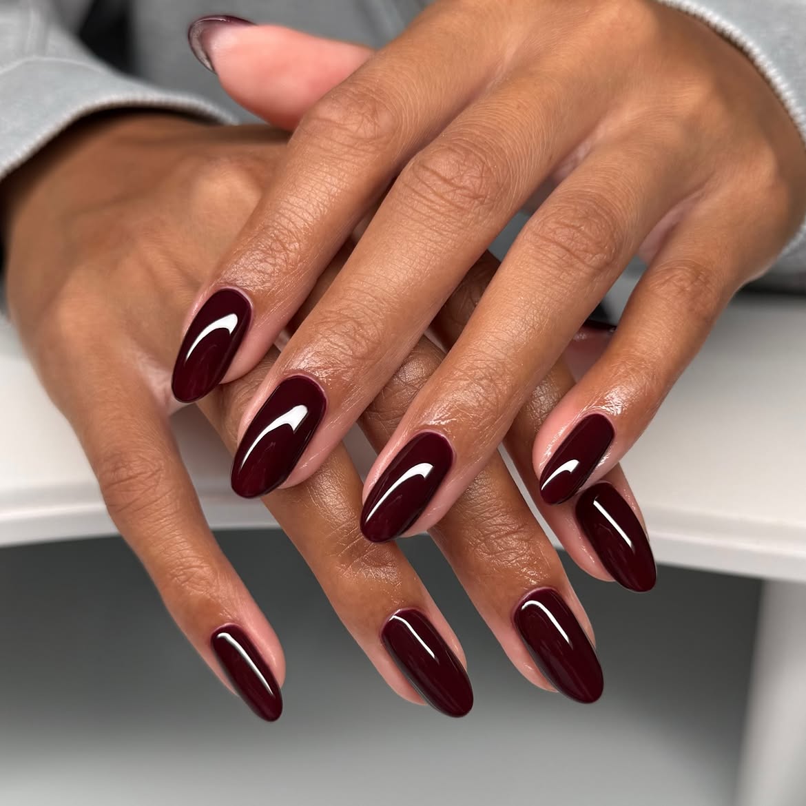Deep Burgundy Glossy Almond Nails
