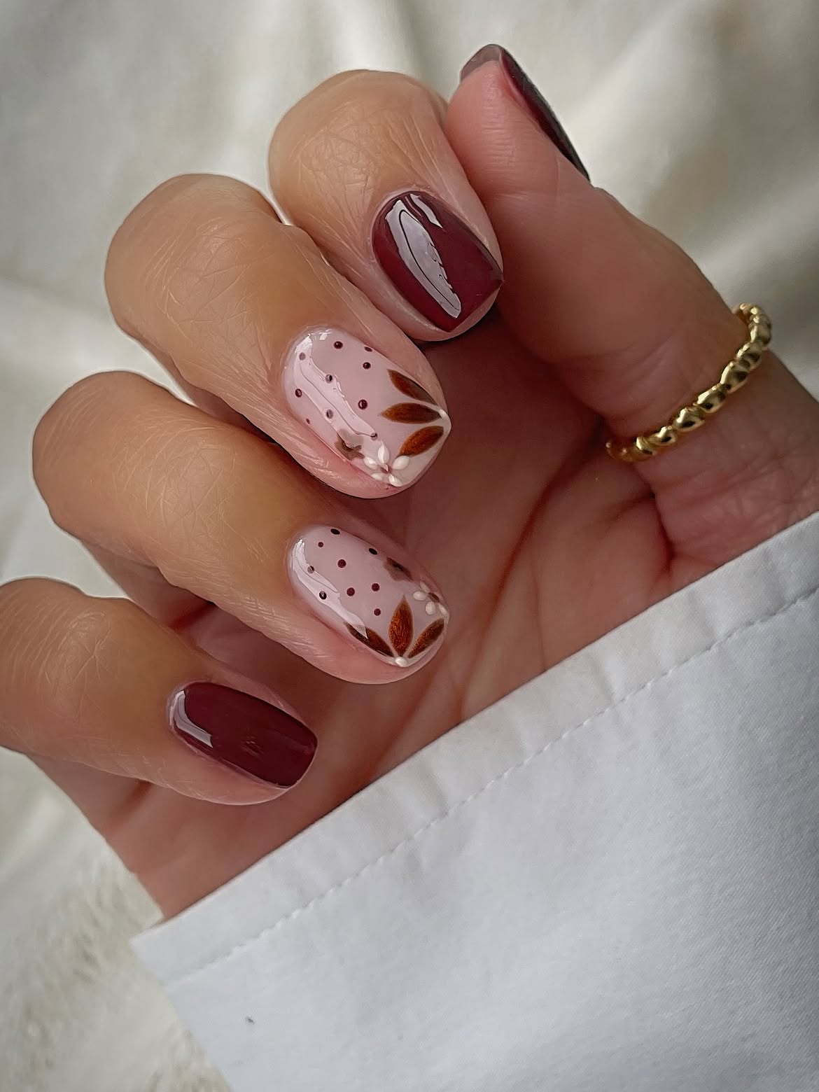 28 Stunning Coffin Nail Ideas for Your Perfect Fall Look 8 Deep Burgundy Matte Coffin Nails with Fall Leaves
