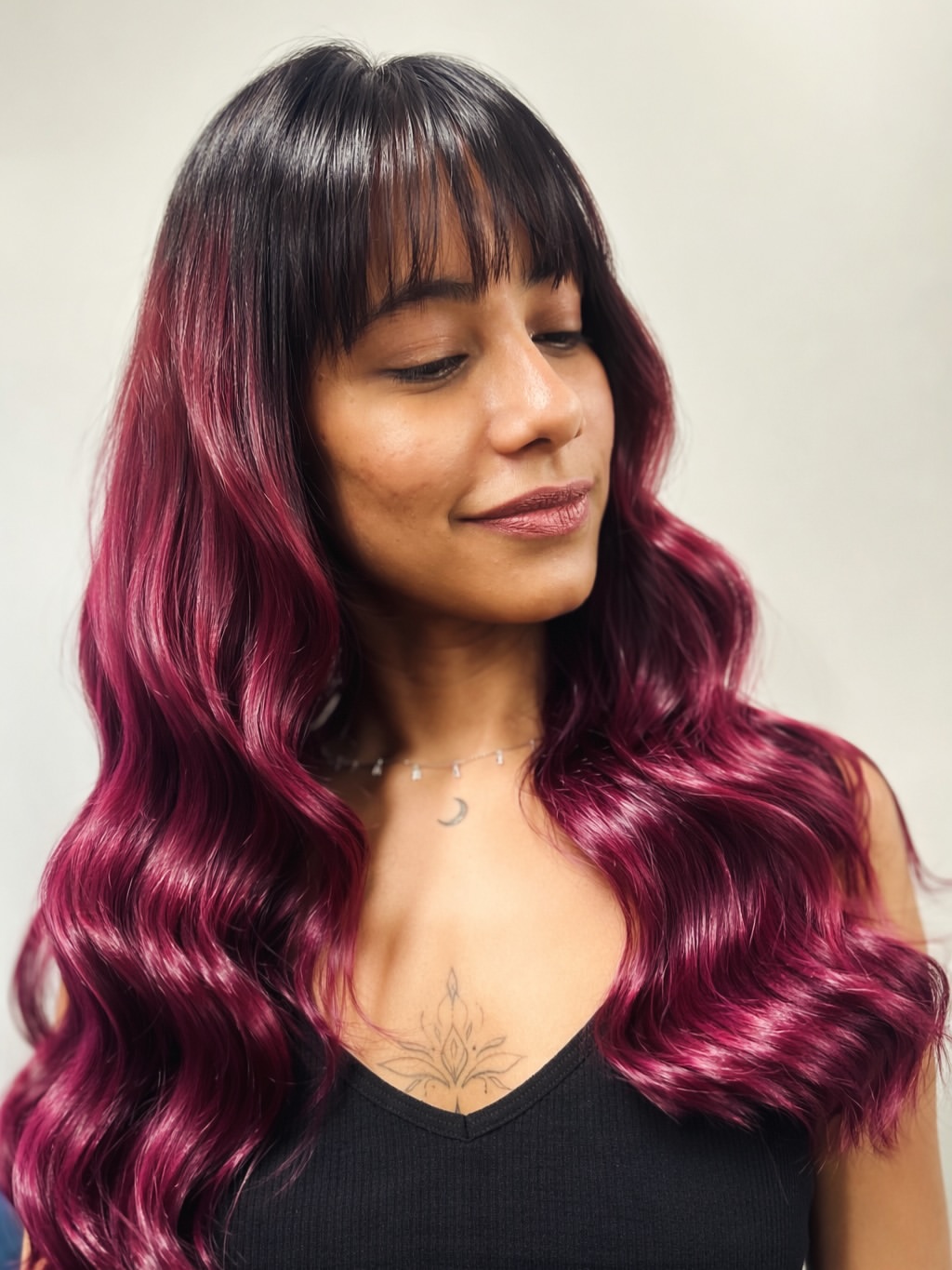 Deep Plum Balayage With Wispy Bangs