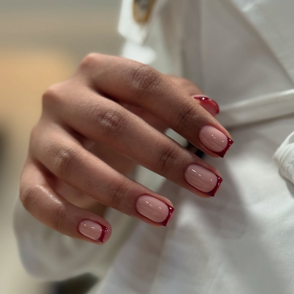 Deep Red French Tip Nails with Milky Base