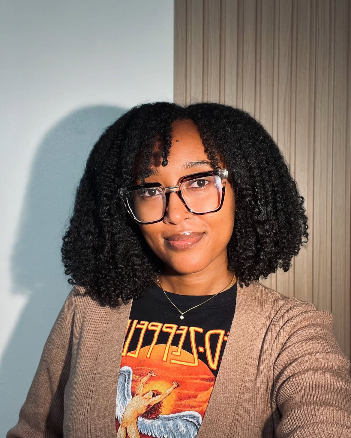 Defined Coils With Soft Bangs