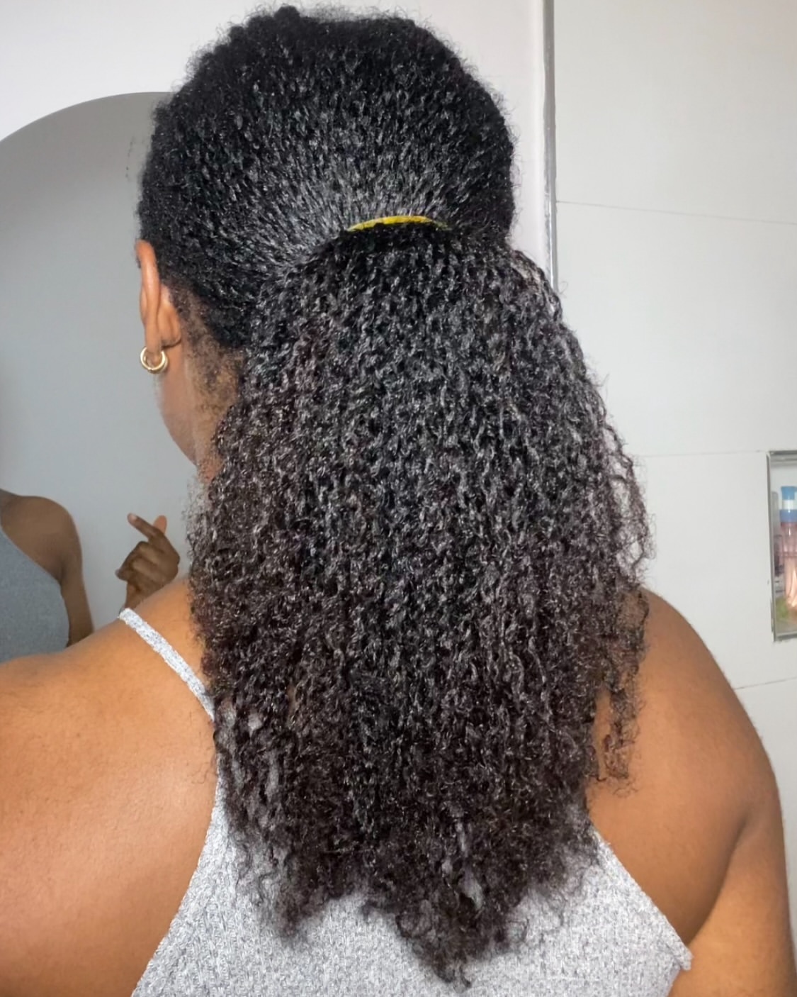 Defined Coily High Ponytail With Volume