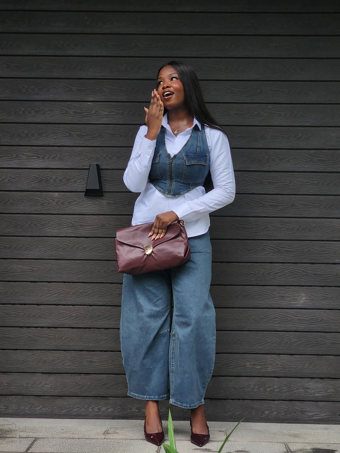 Denim Vest Over White Shirt With Wide Leg Jeans