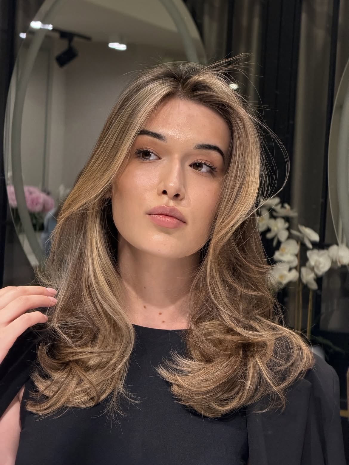 Dimensional Honey Blonde Layers With Soft Waves