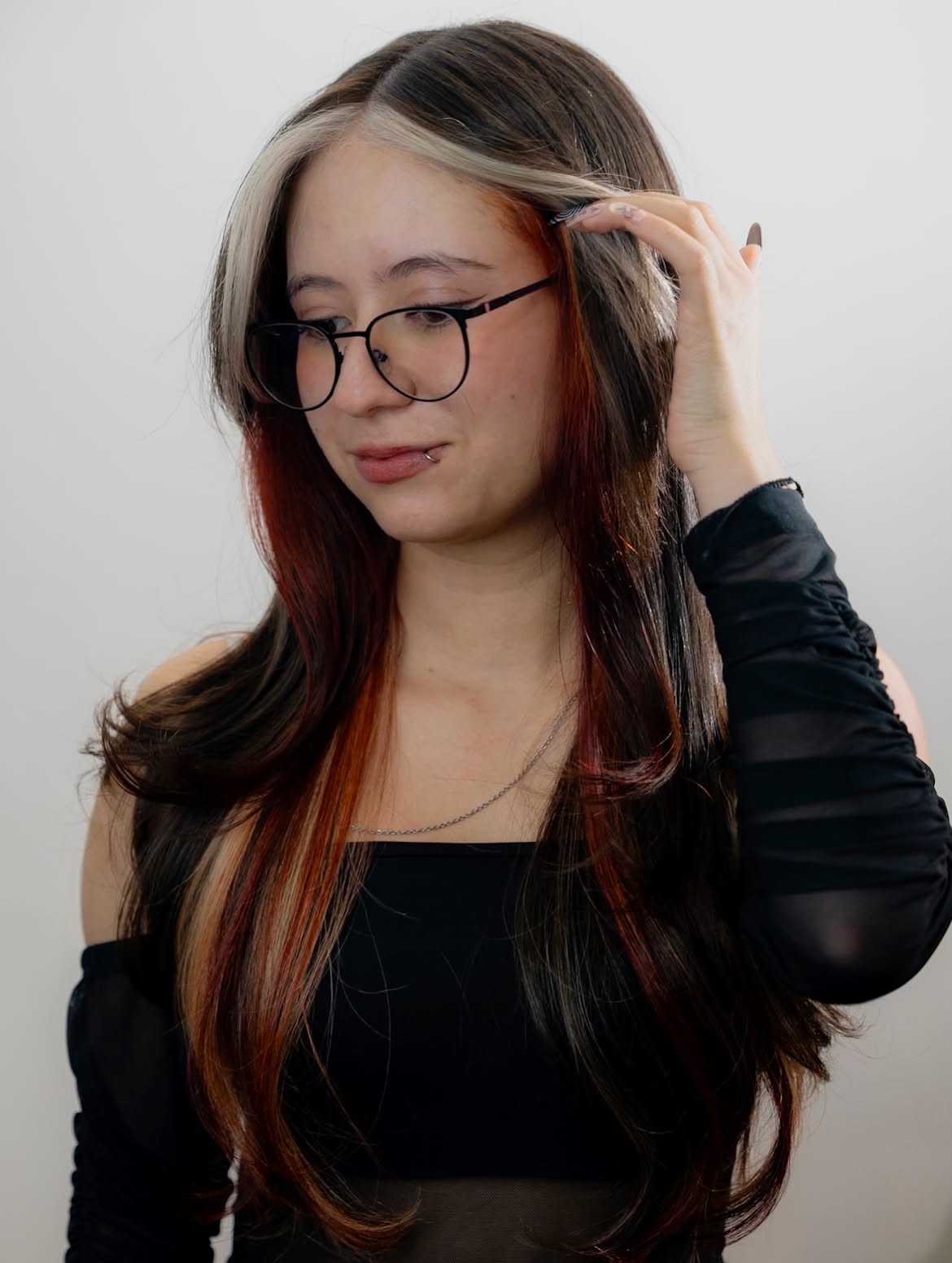 Dramatic Auburn and Blonde Streaks on Long Waves