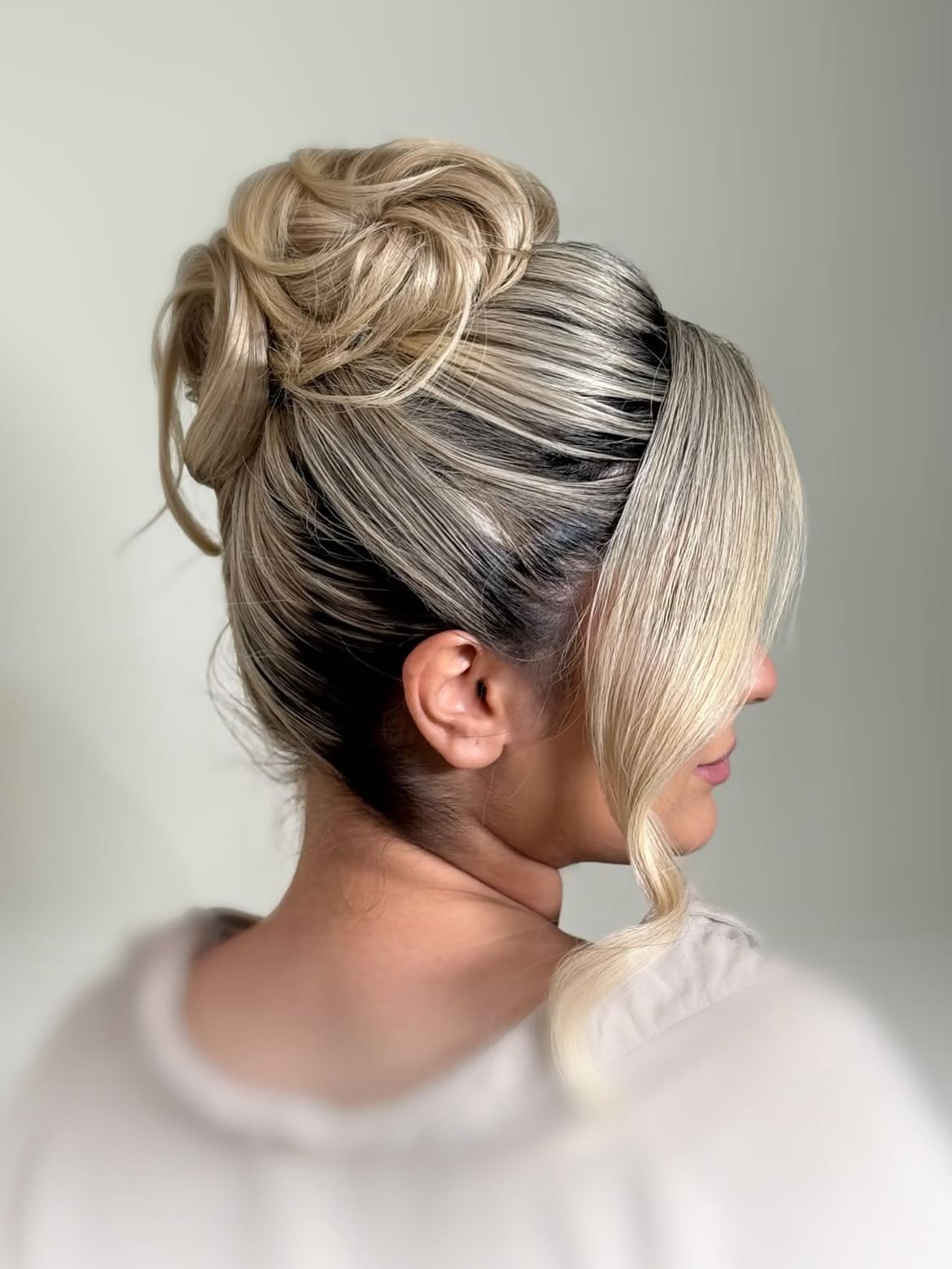 Effortless Messy Updo With Face Framing Pieces
