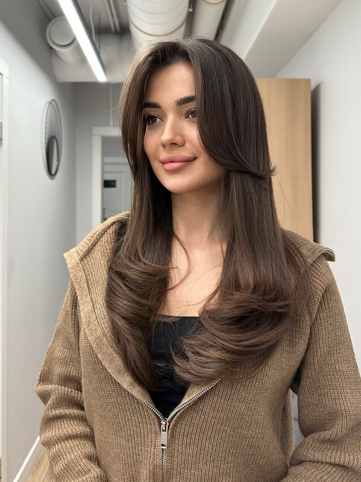 Effortless Voluminous Layers With Face-Framing Bangs