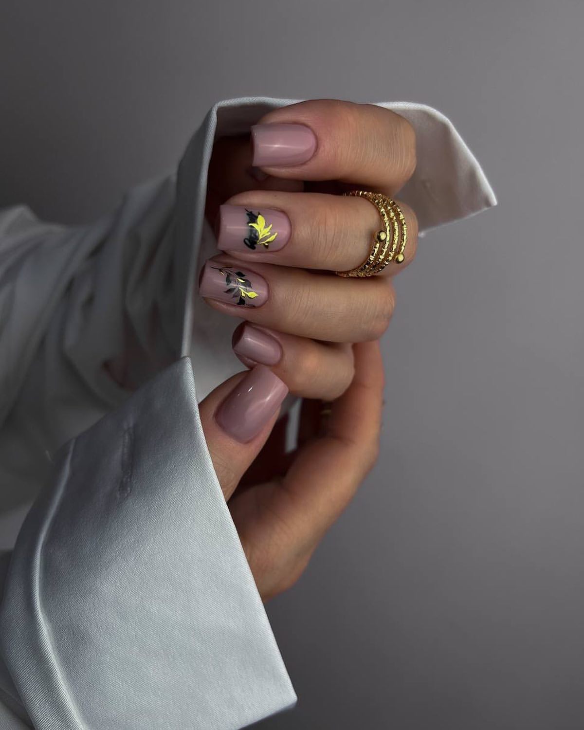 29 Stunning Fall Leaves Nail Ideas You Need To Try Now 22 Elegant Taupe Nails with Gold Leaf Accents