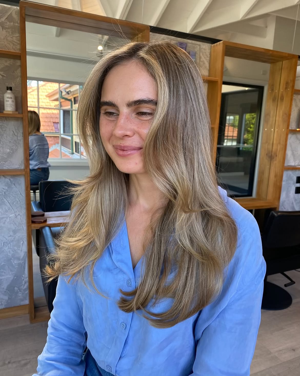 Face-Framing Layers With Honey Blonde Balayage