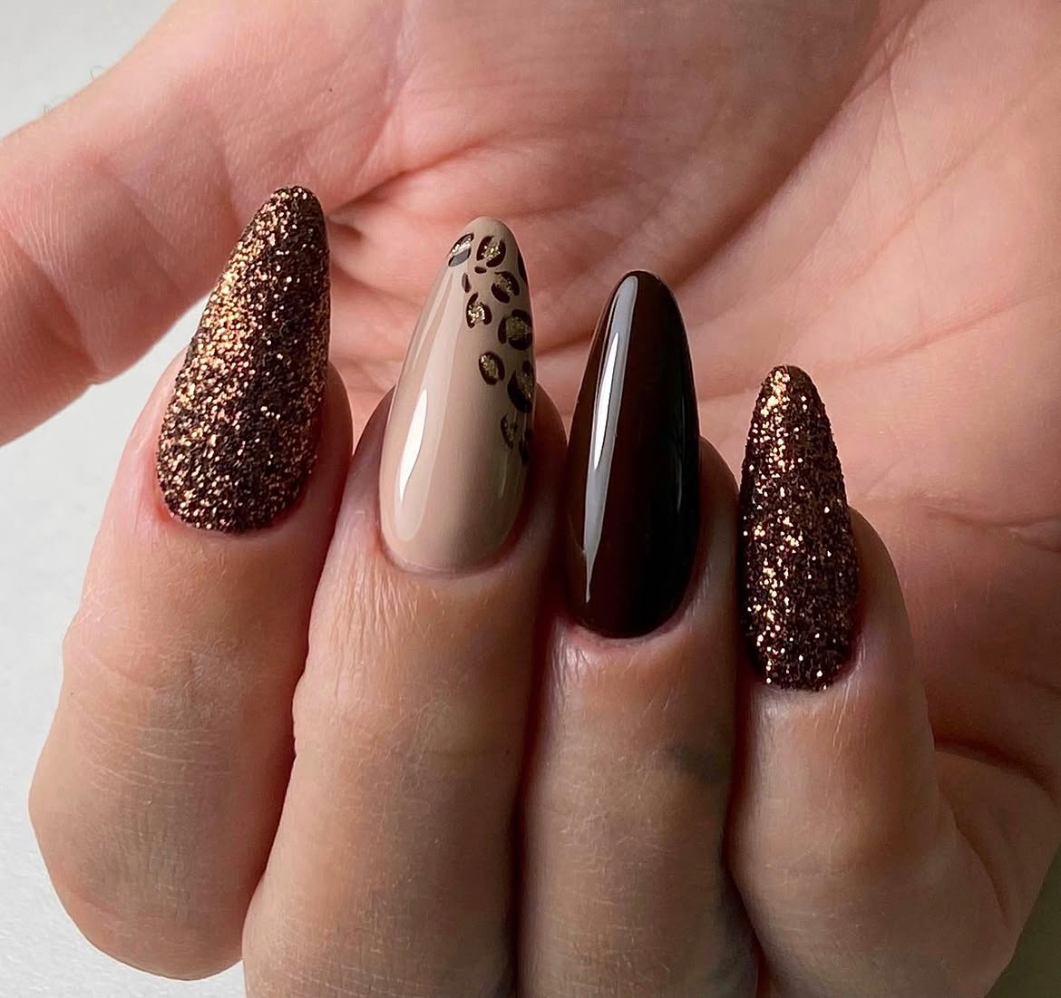 Glam Leopard Print and Glitter Almond Nails