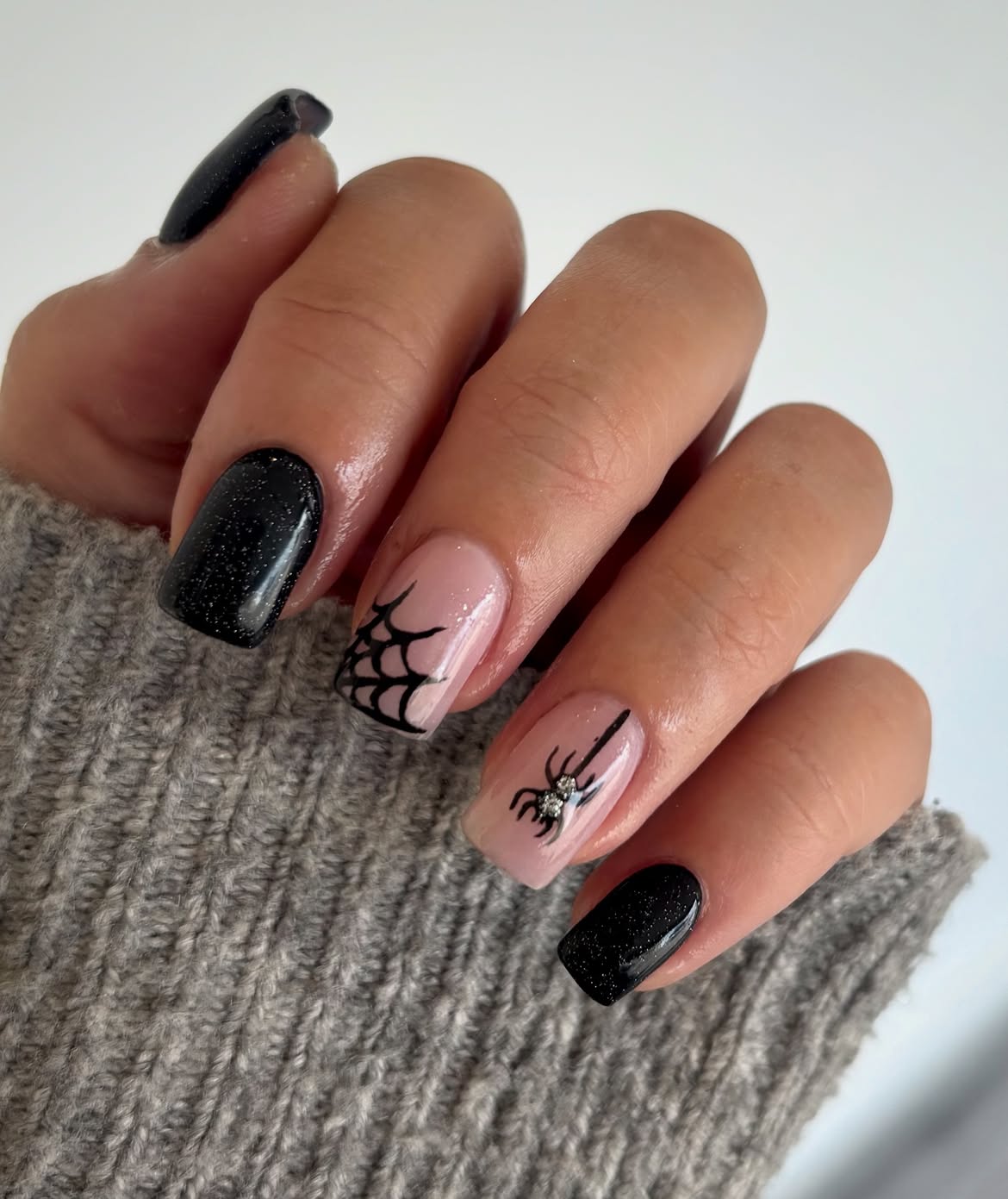 29 Spooky & Chic Halloween Nail Ideas for Short Nails 20 Glittery Black Spiderweb Halloween Nails