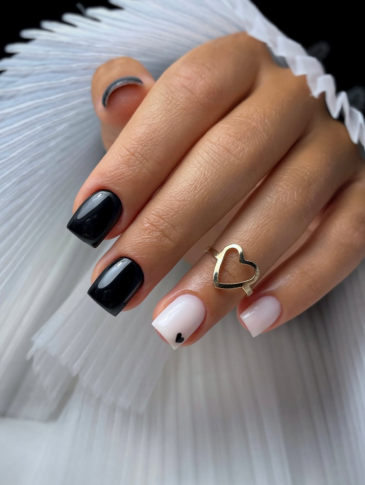 Glossy Black and White French Tips with Heart Detail