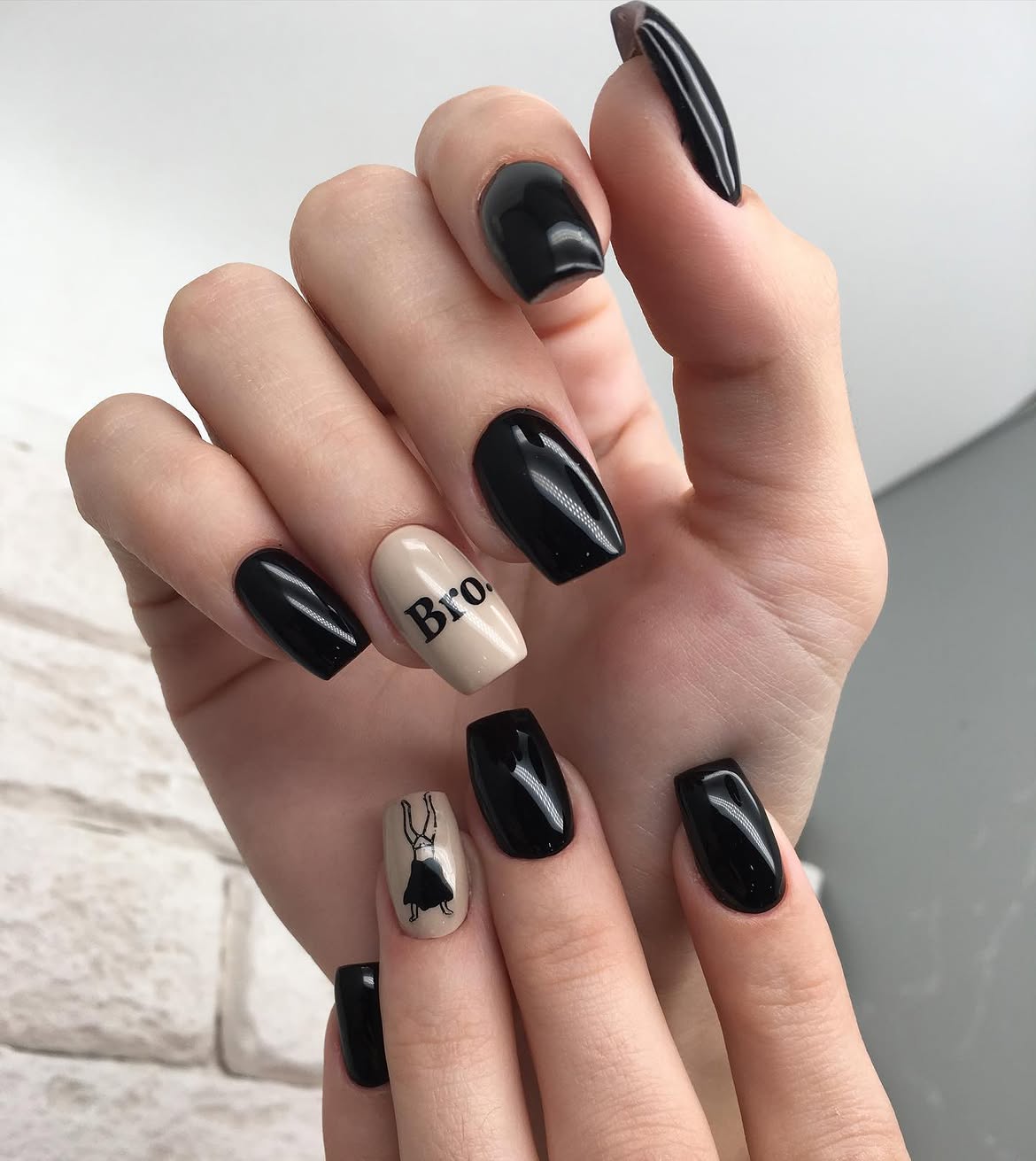 Glossy Black & Nude Accent Coffin Nails