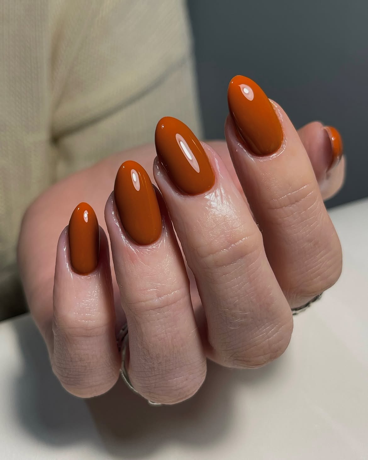 28 Stunning Orange Fall Nail Ideas You Need to Try 8 Glossy Burnt Orange Oval Nails