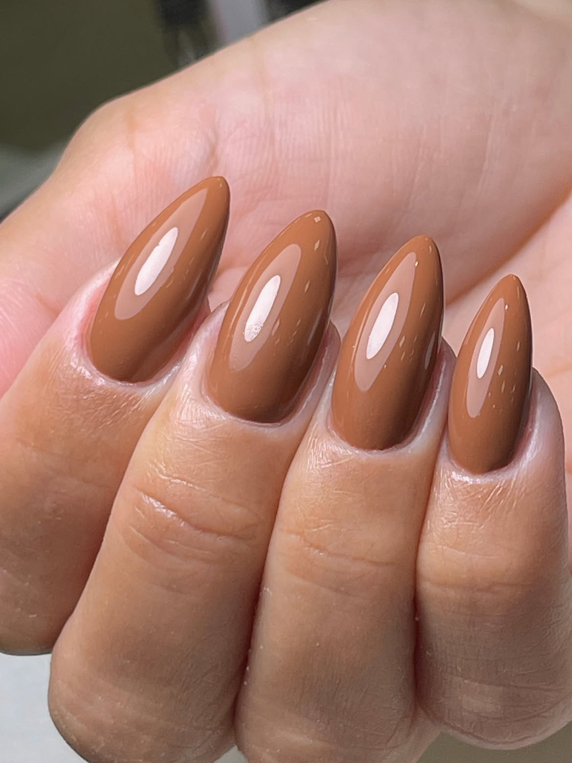 Glossy Caramel Brown Almond Nails