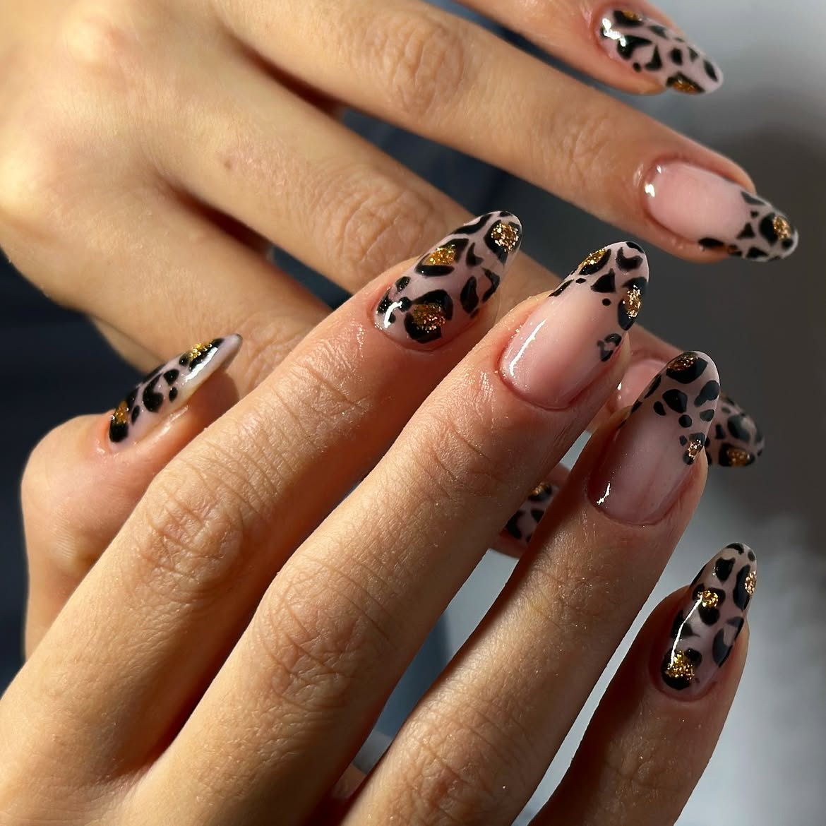 Glossy Cheetah French Tip Almond Nails