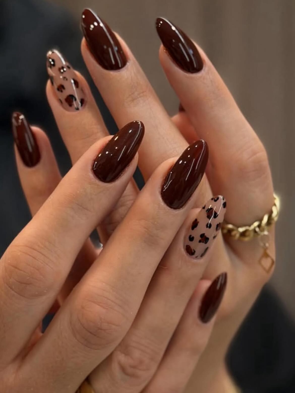 Glossy Deep Brown Almond Cheetah Accent Nails