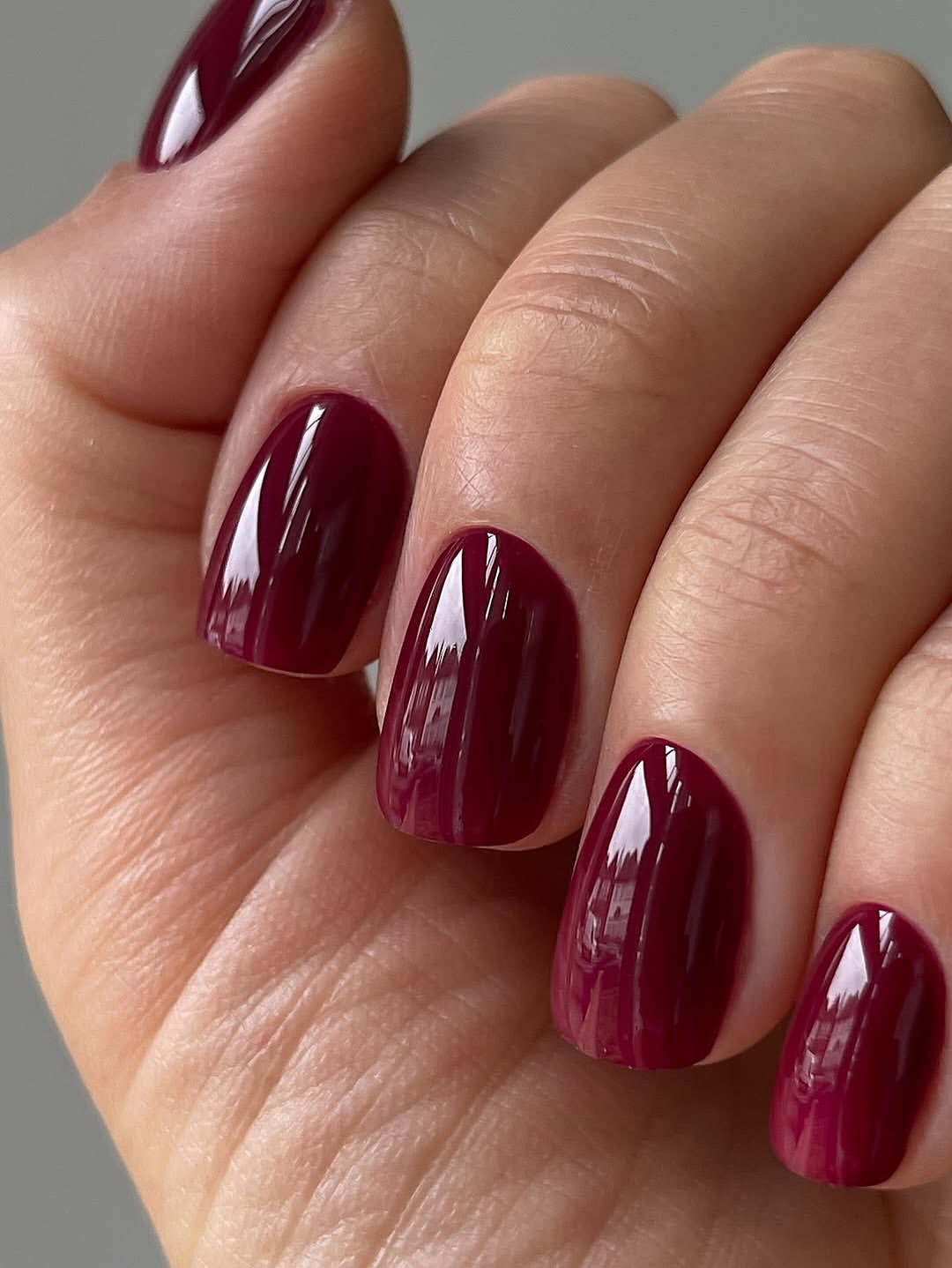 Glossy Deep Burgundy Oval Nails