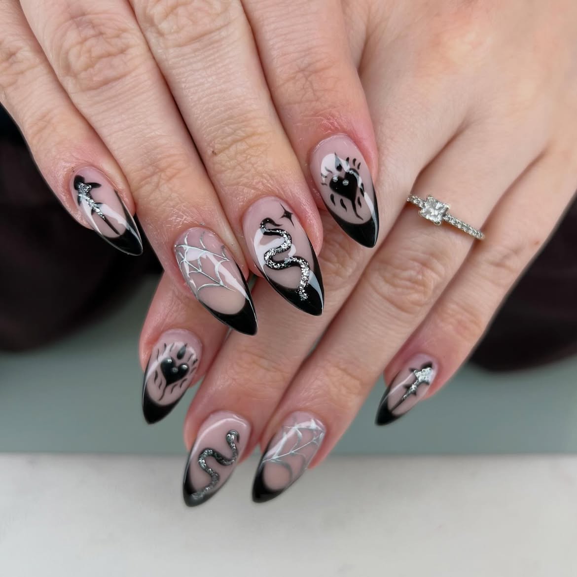 Gothic Black French Tip Almond Nails with Snake Art