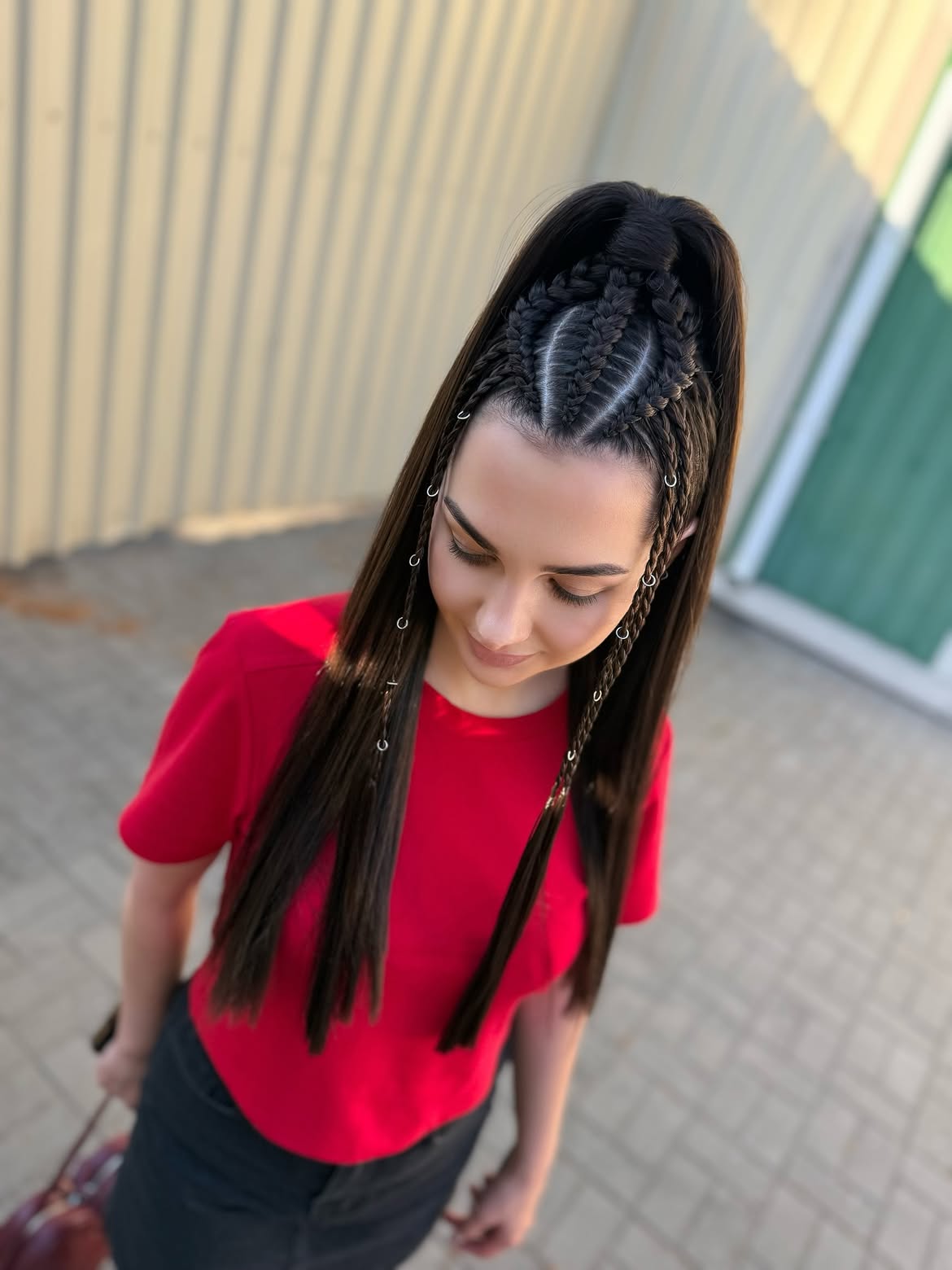 High Ponytail With Accent Braids And Rings