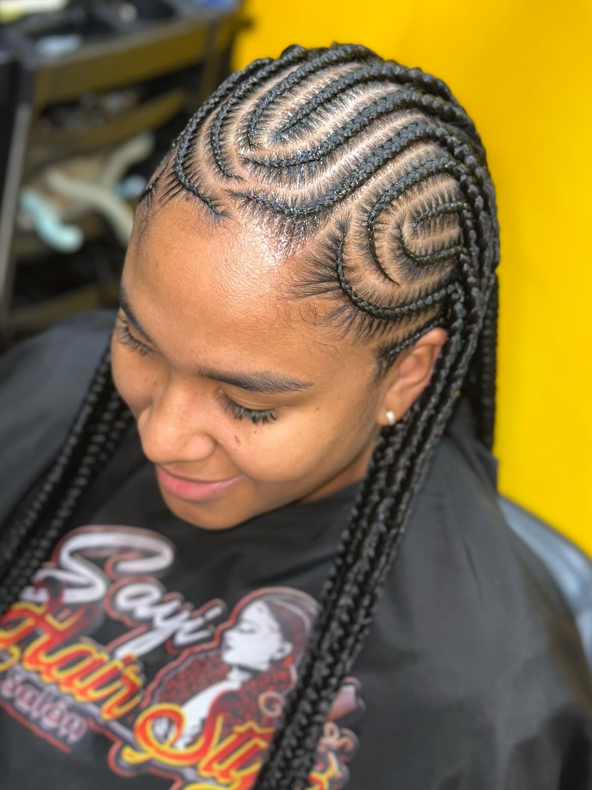 Intricate Fulani Braids With Swirled Cornrows