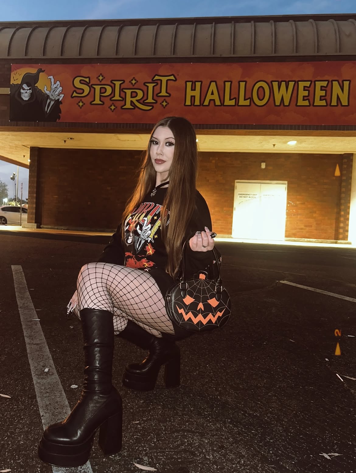 Jack O'Lantern Bag And Fishnet Halloween Look