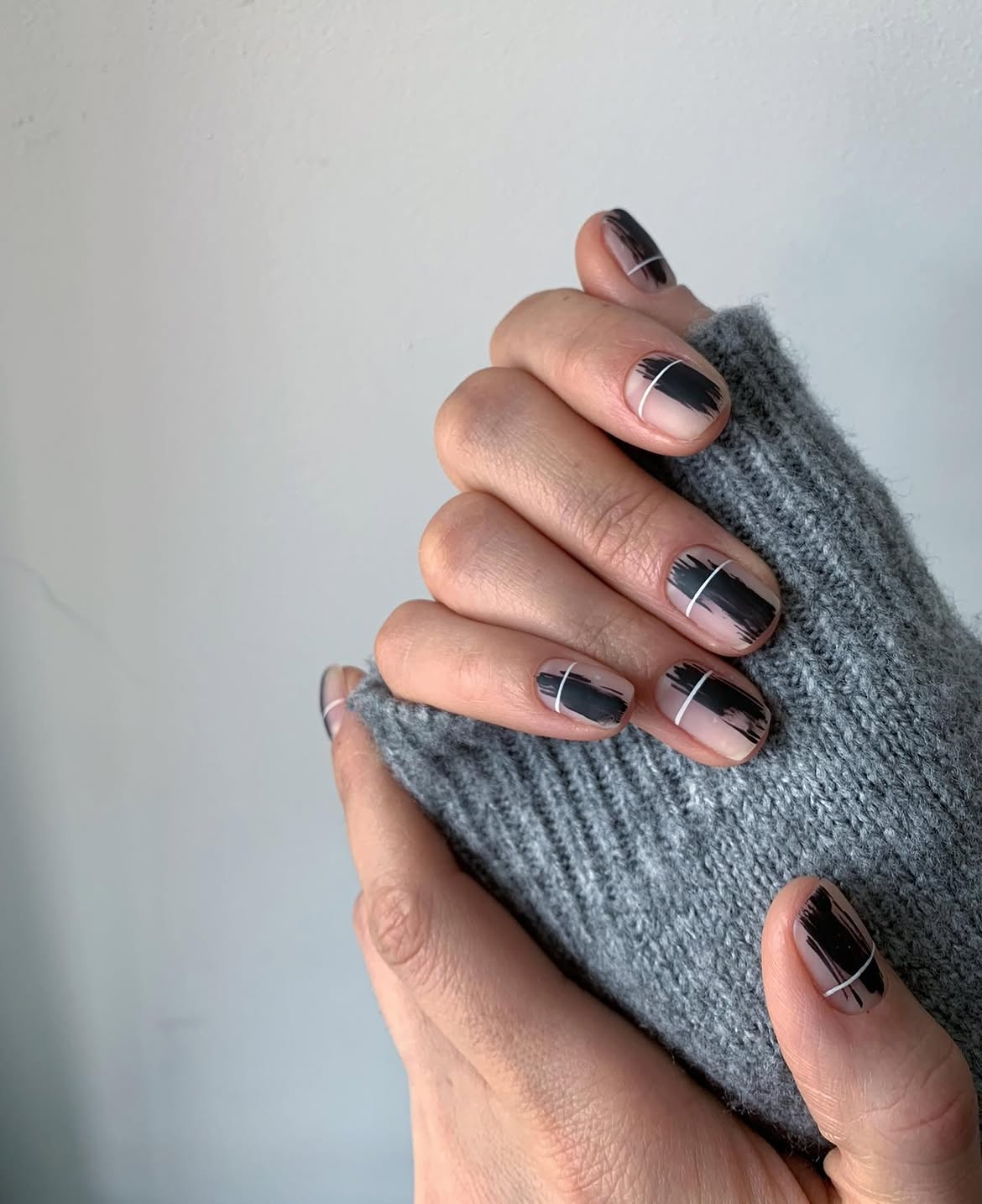 Matte Black Brushstroke Nails with White Lines