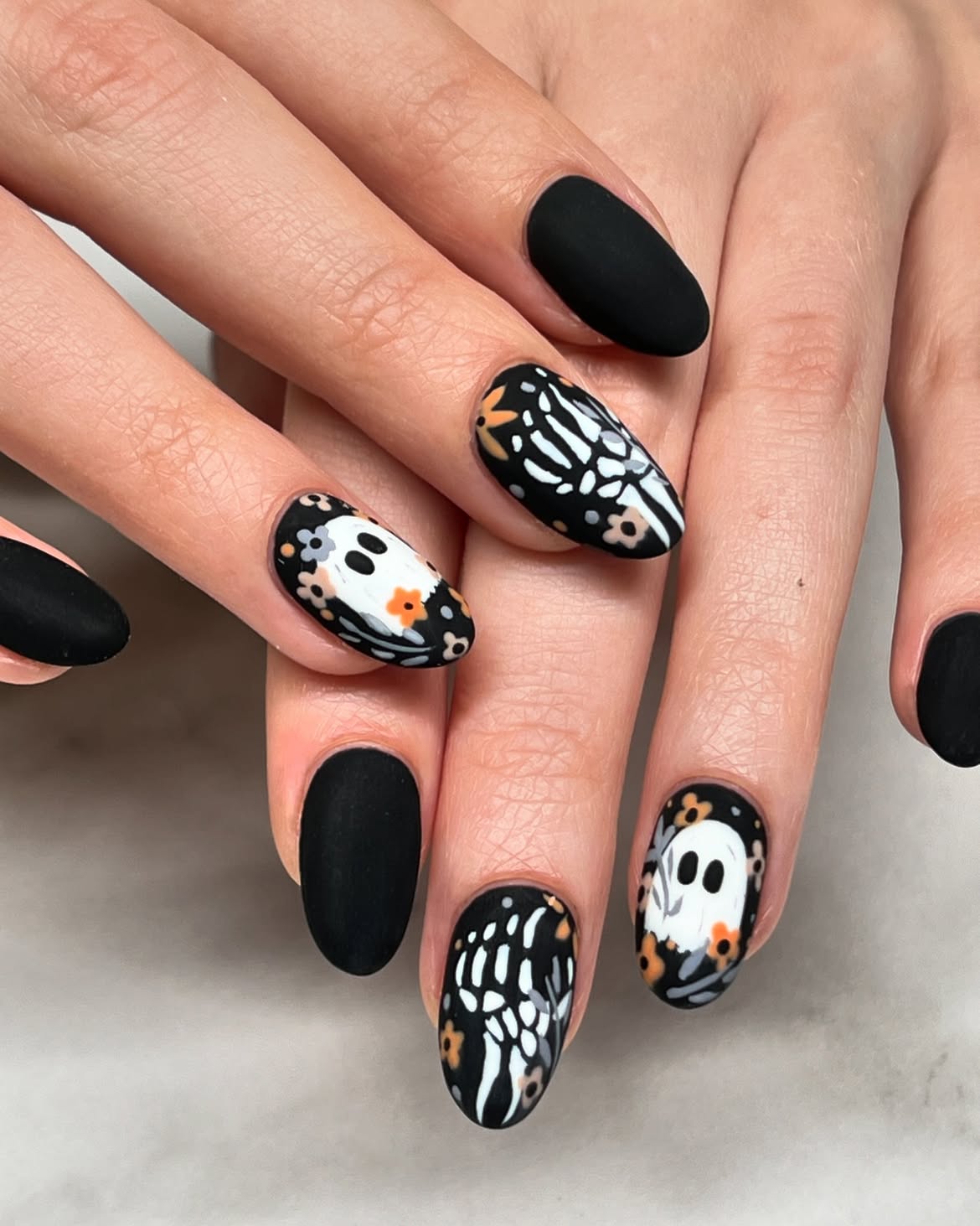 29 Stunning October Nail Ideas You Need To Try Now 30 Matte Black Halloween Ghost and Skeleton Nails
