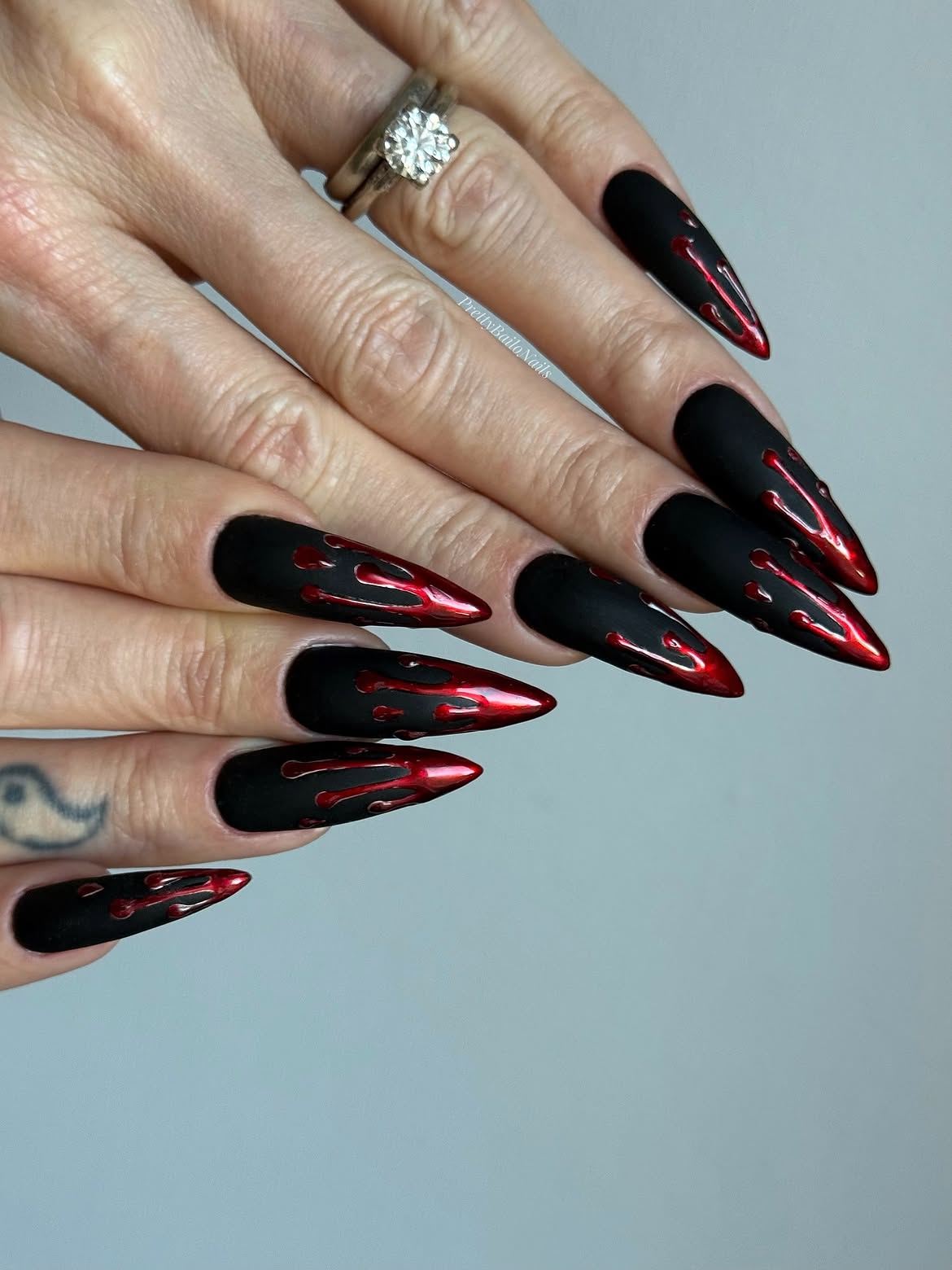 Matte Black Stiletto Nails With Dripping Blood Art