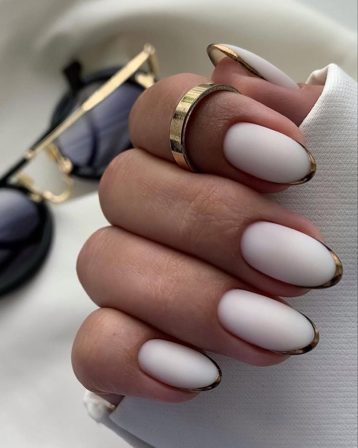 Matte Milky White Oval Nails With Gold French Tips