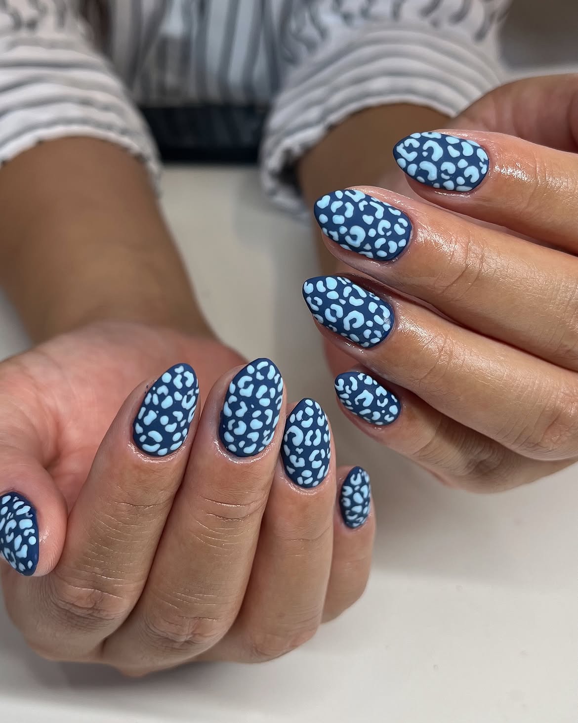 Matte Navy Blue Cheetah Print Almond Nails