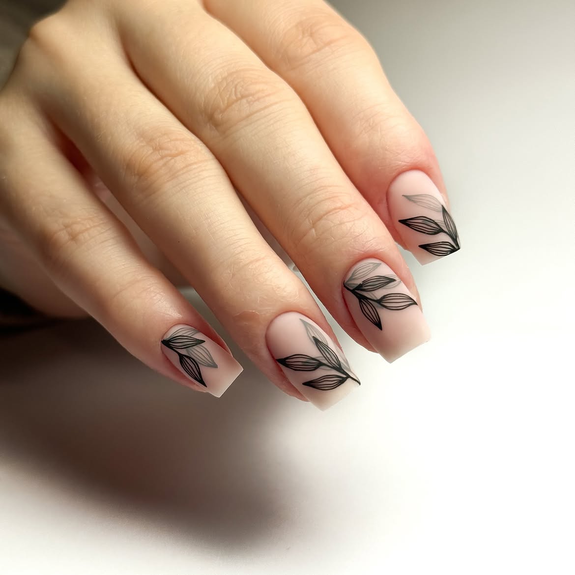 29 Stunning Fall Leaves Nail Ideas You Need To Try Now 5 Matte Nude Square Nails with Black Leaf Art