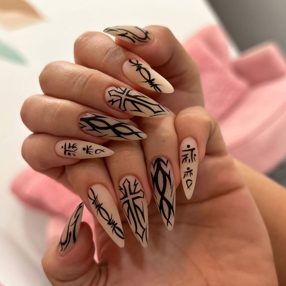 Matte Nude Stiletto Nails with Black Gothic Art