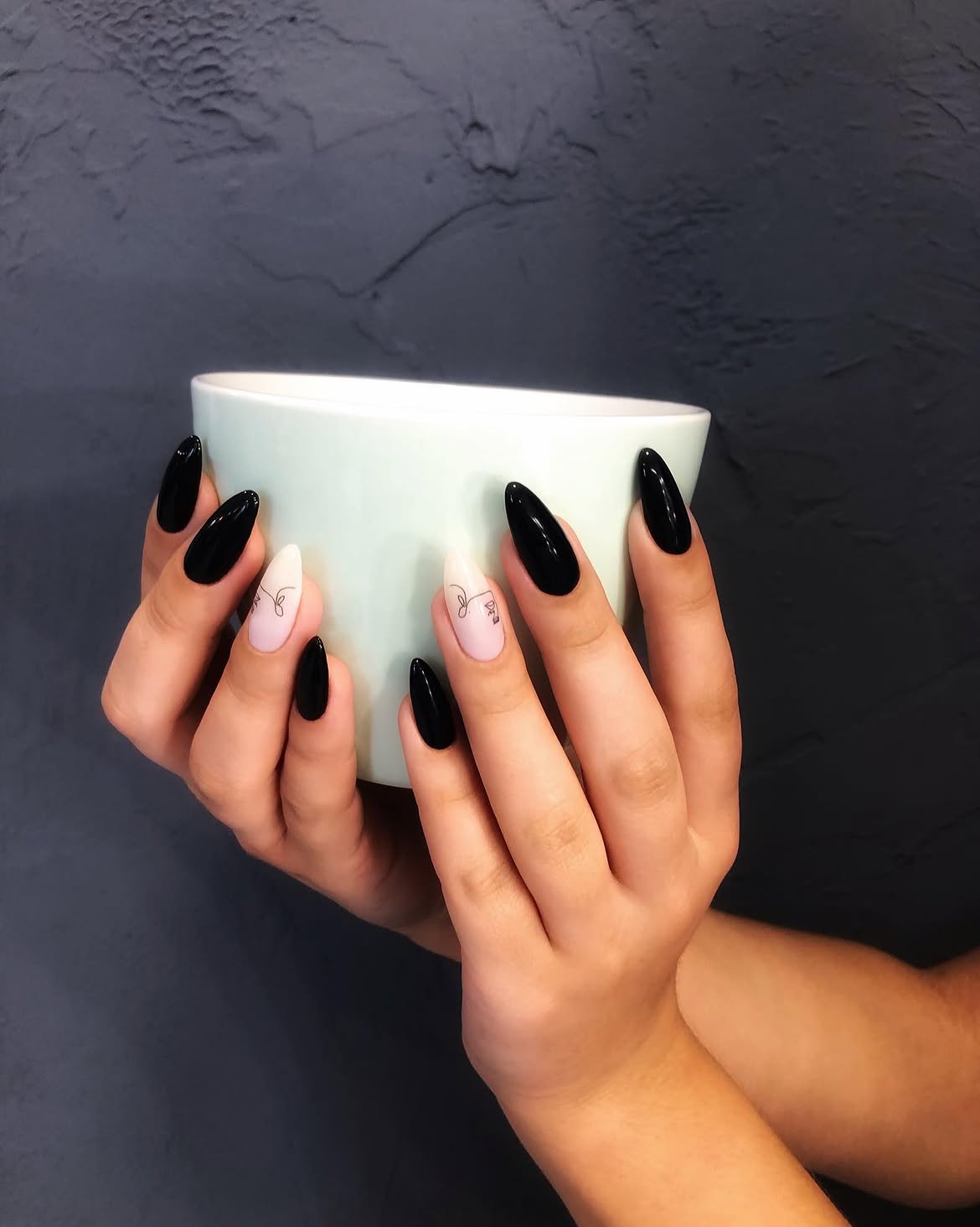 Midnight Black Stiletto Nails with Subtle Line Art