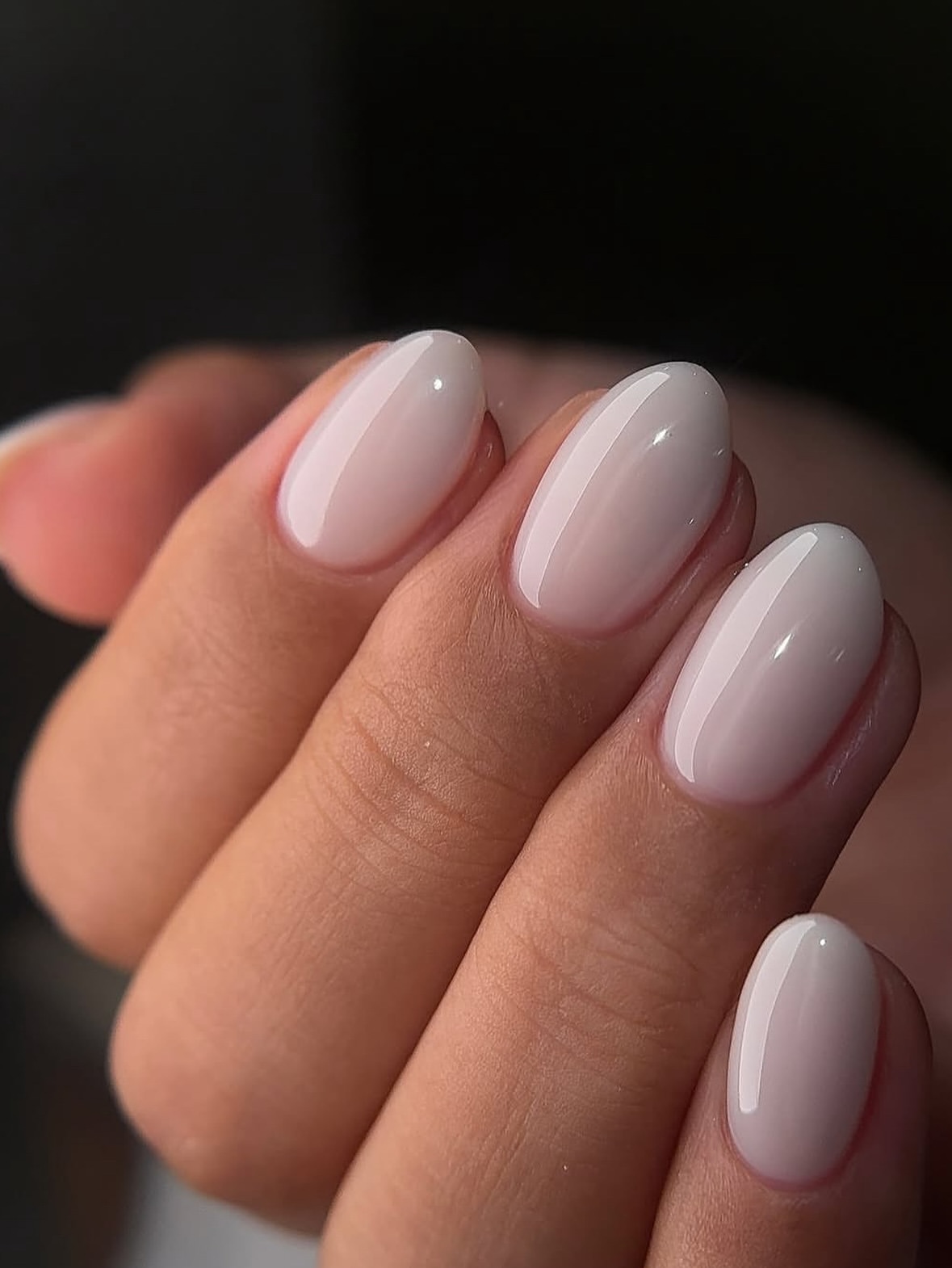 Milky Nude Oval Nails With High Gloss Finish