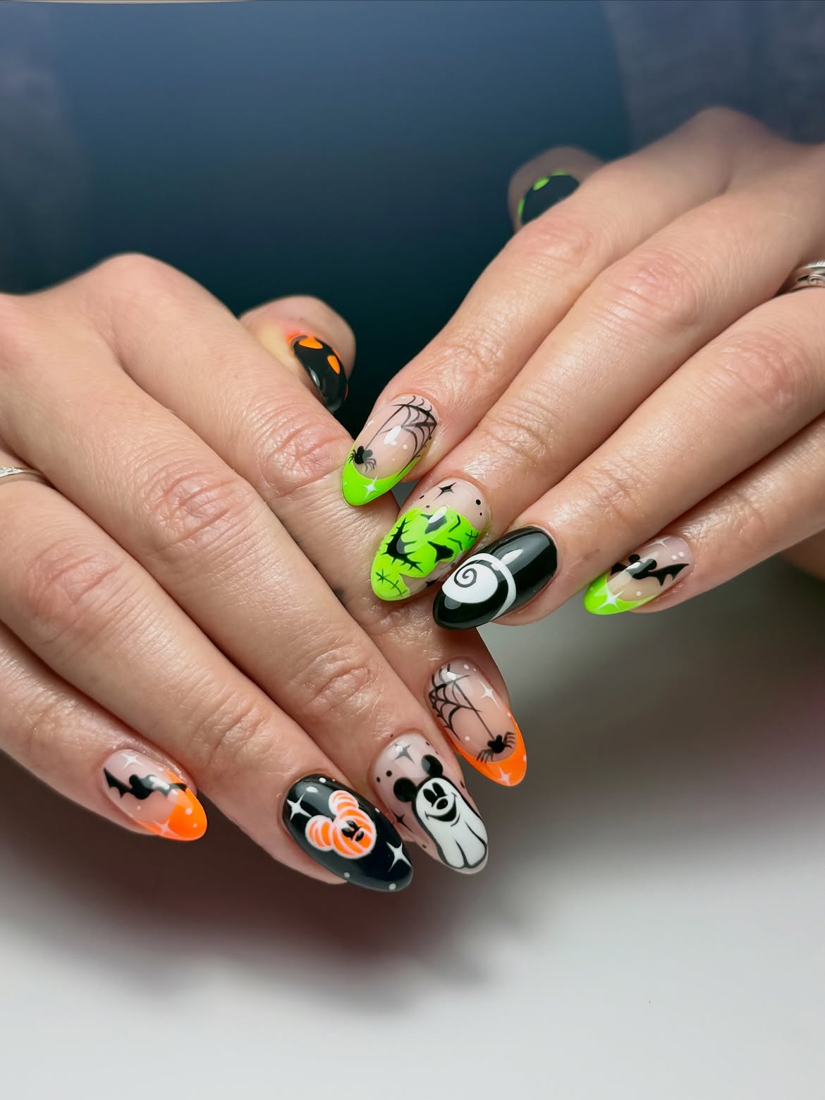 28 Spooktacular Halloween Nail Ideas You Need To Try 16 Neon Halloween Character Art Oval Nails