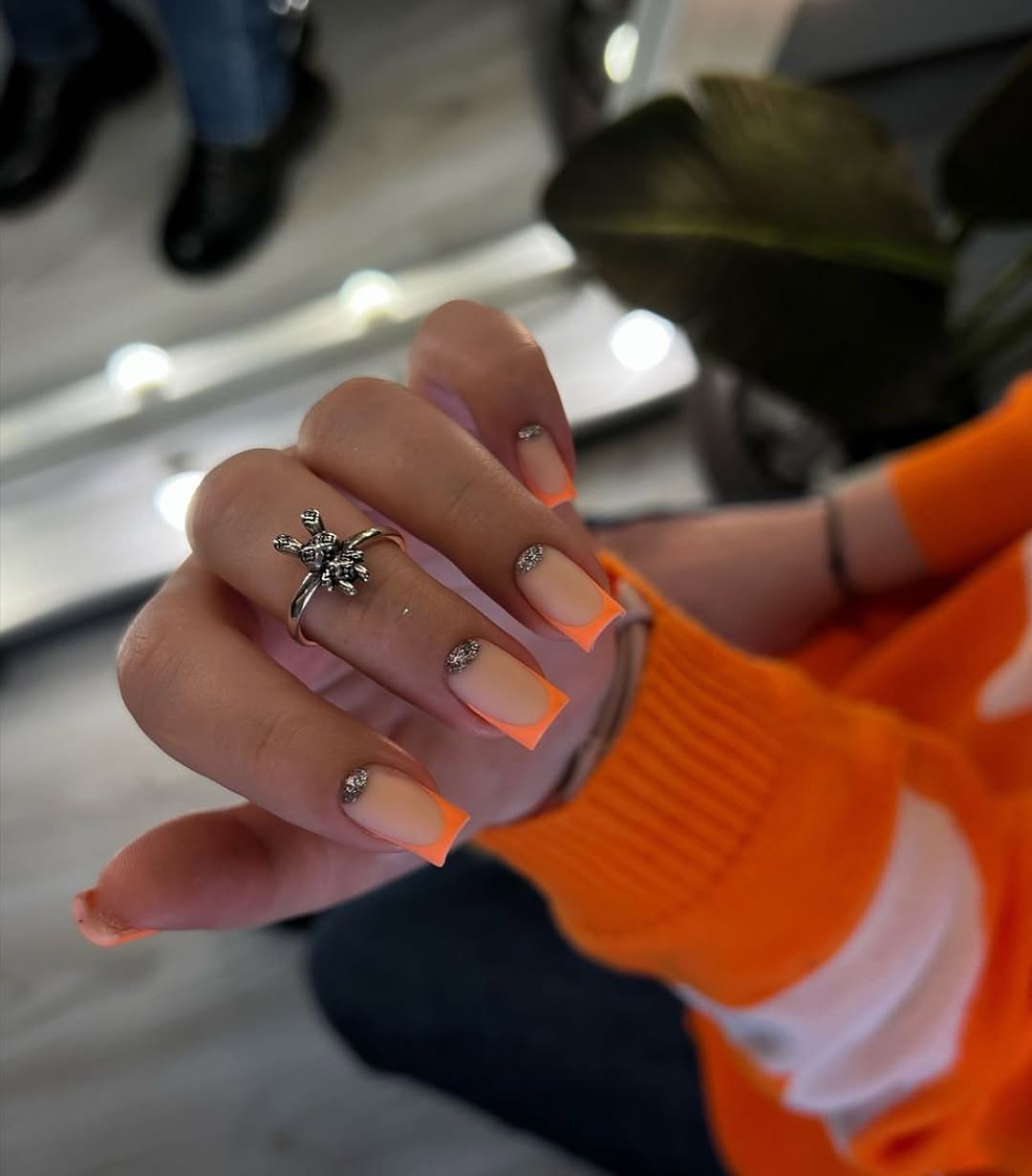 Neon Orange French Tips With Glitter Accents