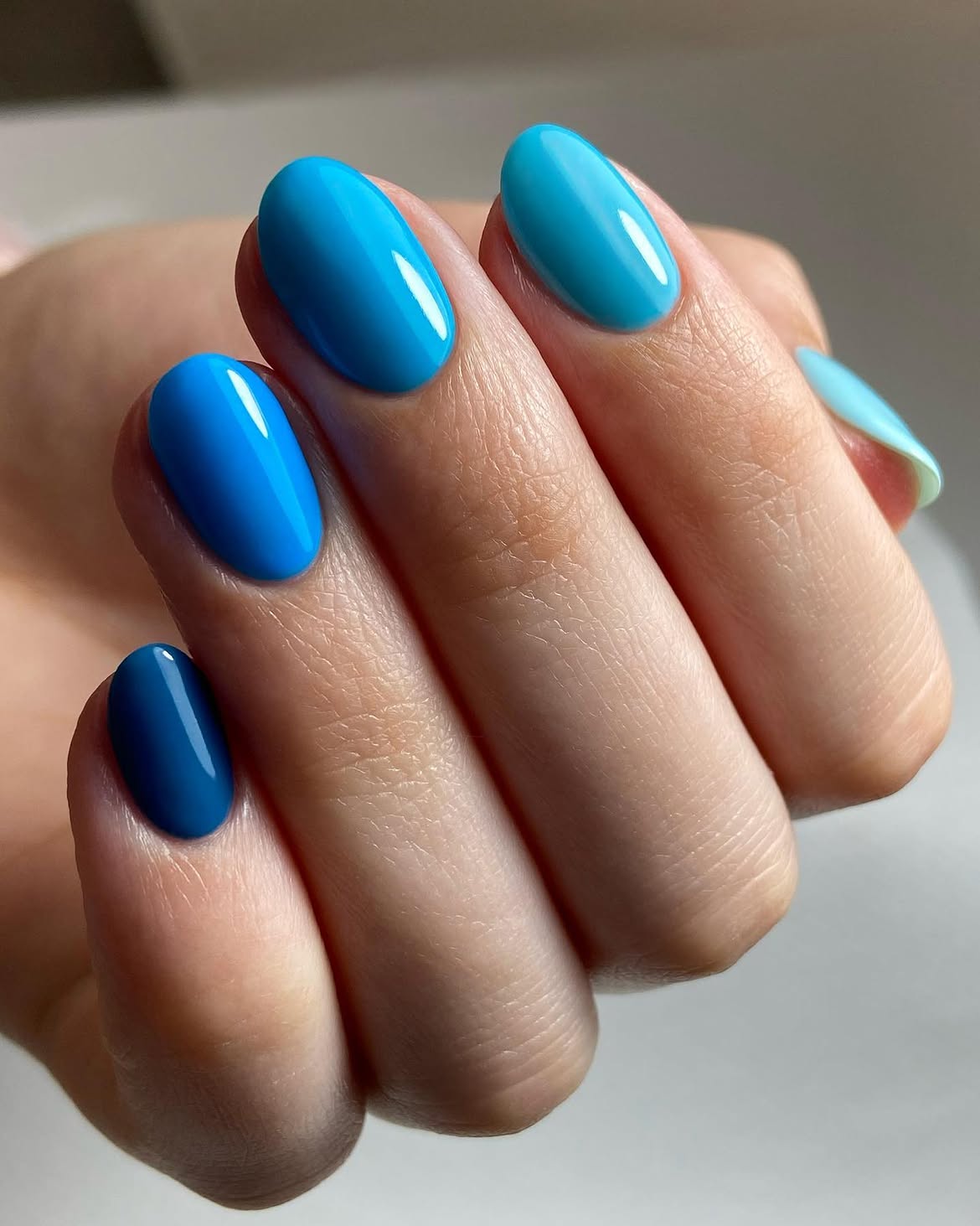 Ocean Blue Glossy Oval Nails