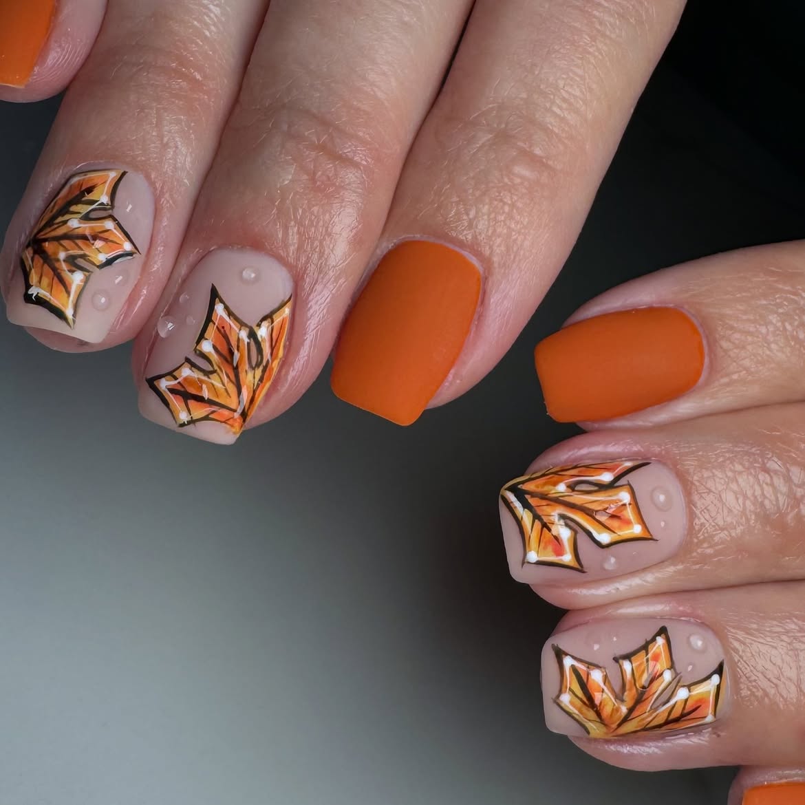 29 Stunning Fall Leaves Nail Ideas You Need To Try Now 26 Orange Maple Leaf Matte Fall Nails with Dewdrops