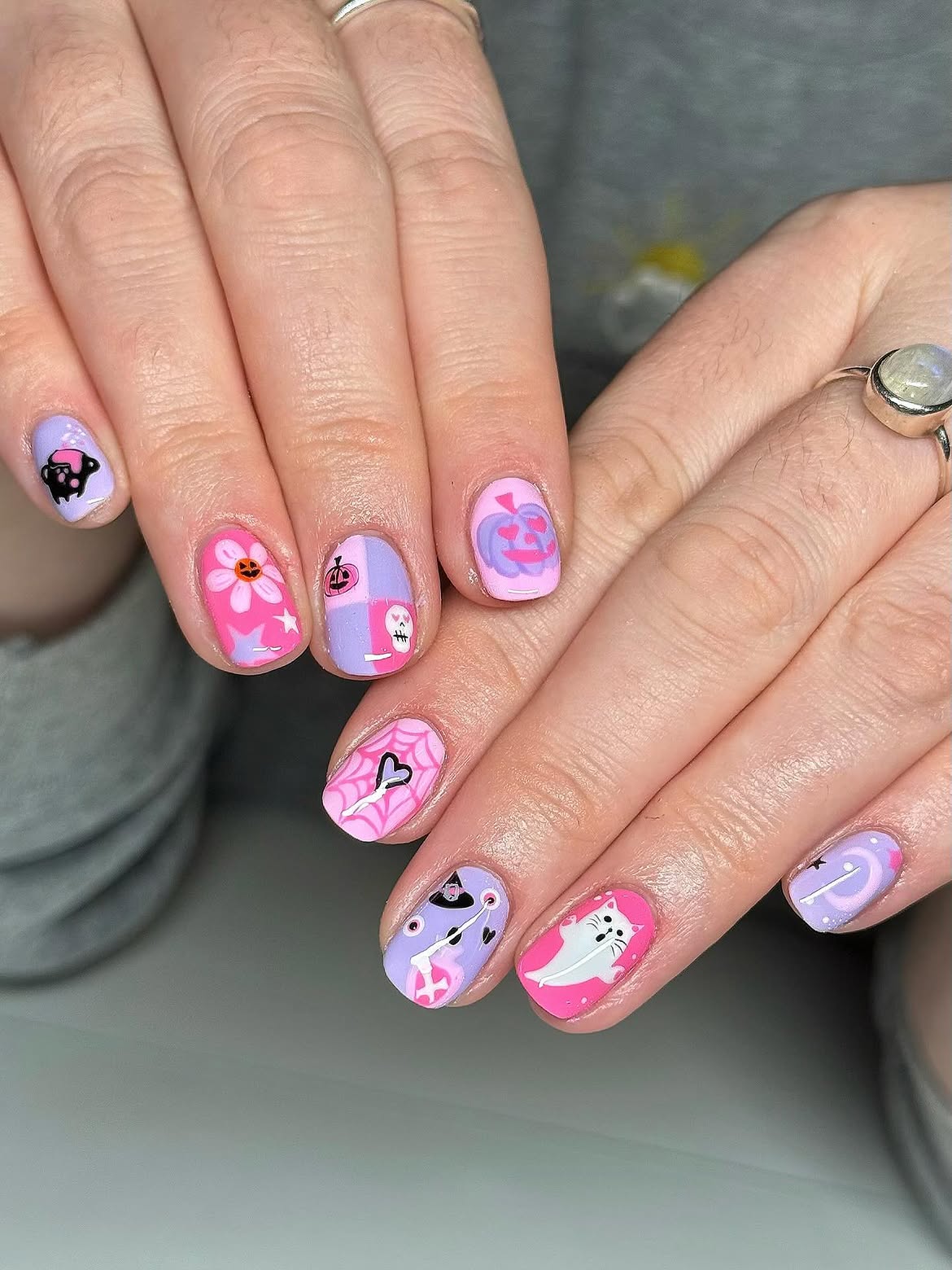 27 Spooktacular Pink Halloween Nail Ideas You Need 14 Pastel Pink and Lilac Halloween Nail Art