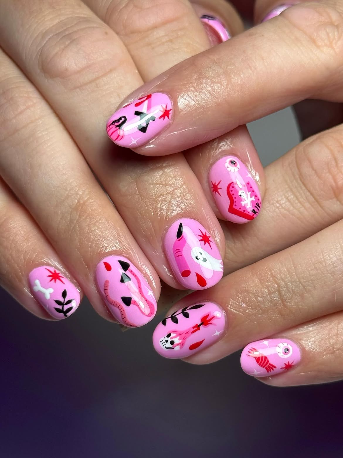 27 Spooktacular Pink Halloween Nail Ideas You Need 12 Pink Halloween Ghost & Guts Oval Nails