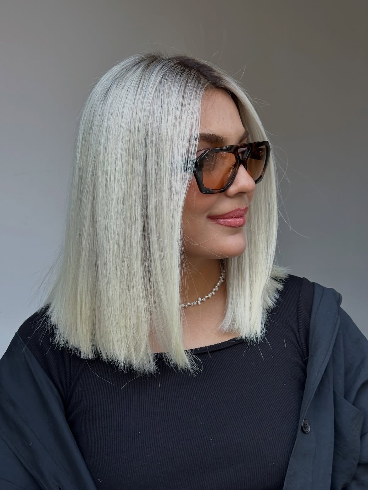 Platinum Blonde Collarbone Bob With Subtle Waves